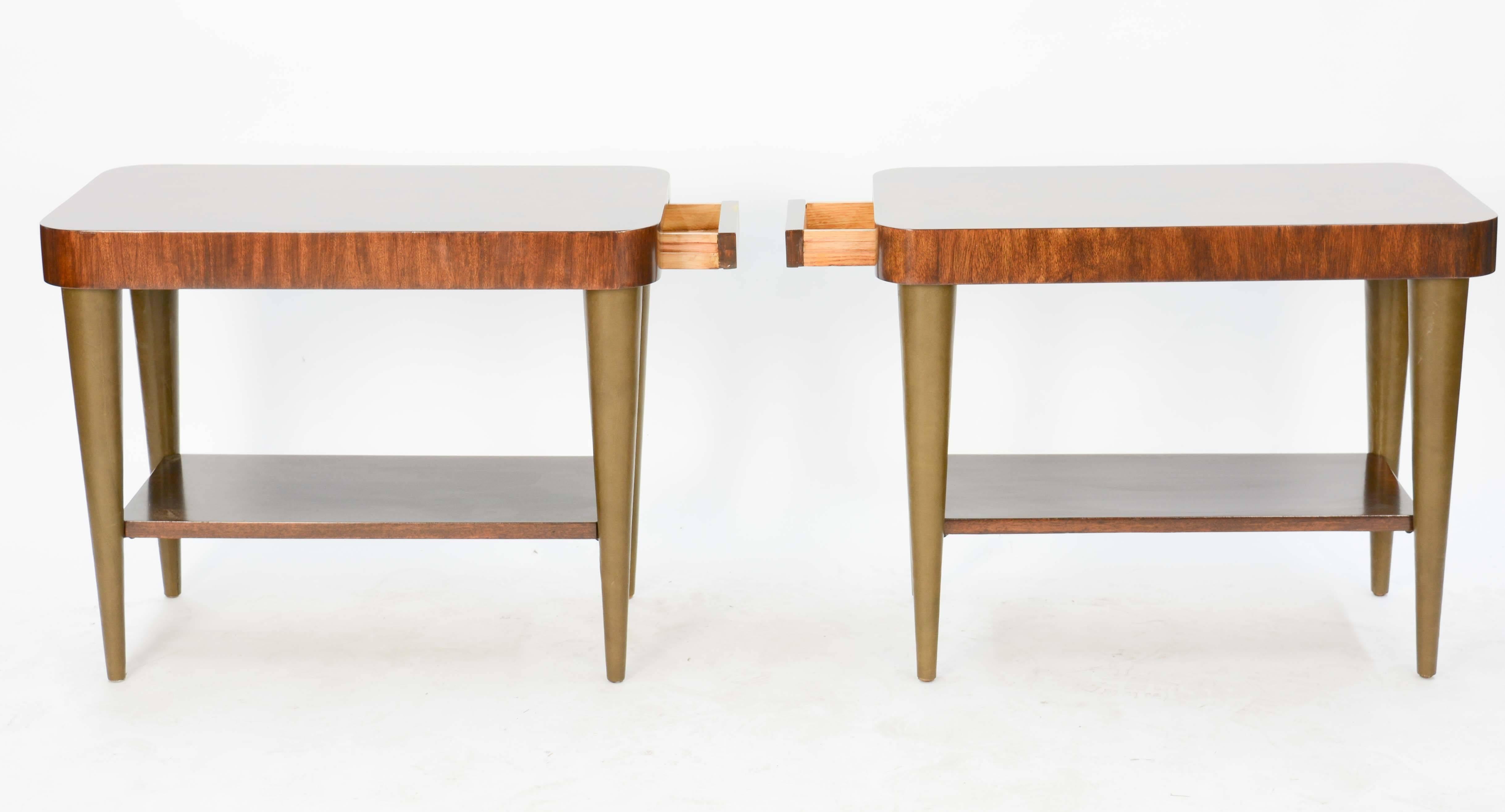 A classic Gilbert Rohde's side tables Paldao series for Herman Miller. Fully refinished and restored in both burl tops and leather legs. One of Miller finest lines of elegant pre ware design. These pieces have the versatility to be nightstands or