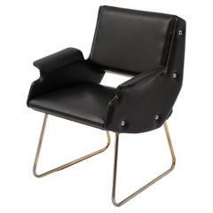 Fauteuil noir Gilbert Steiner, France, années 1960