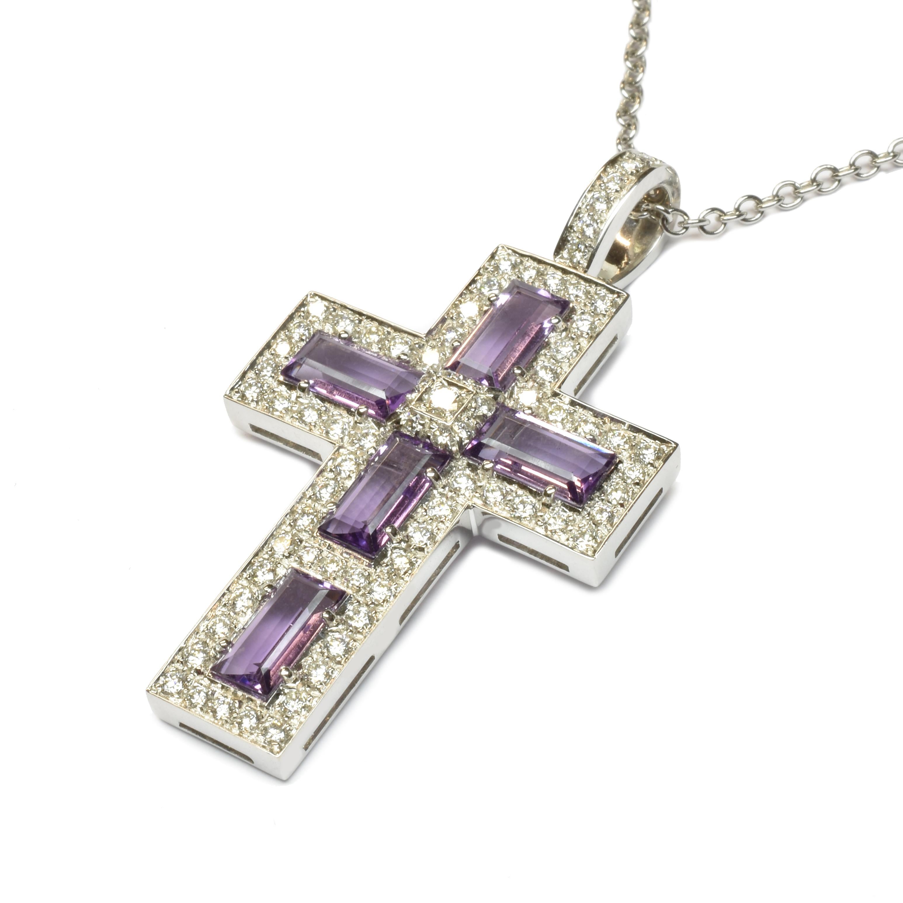 Gilberto Cassola 18Kt White Gold Cross Pendant with Amethyst Baguettes and White Diamonds.
Handmade in our Atelier in Valenza (Italy).
This Piece comes with a 46 cm 18Kt White Gold Chain
A Modern and Stylish Cross for an everyday use.
G Color Vs