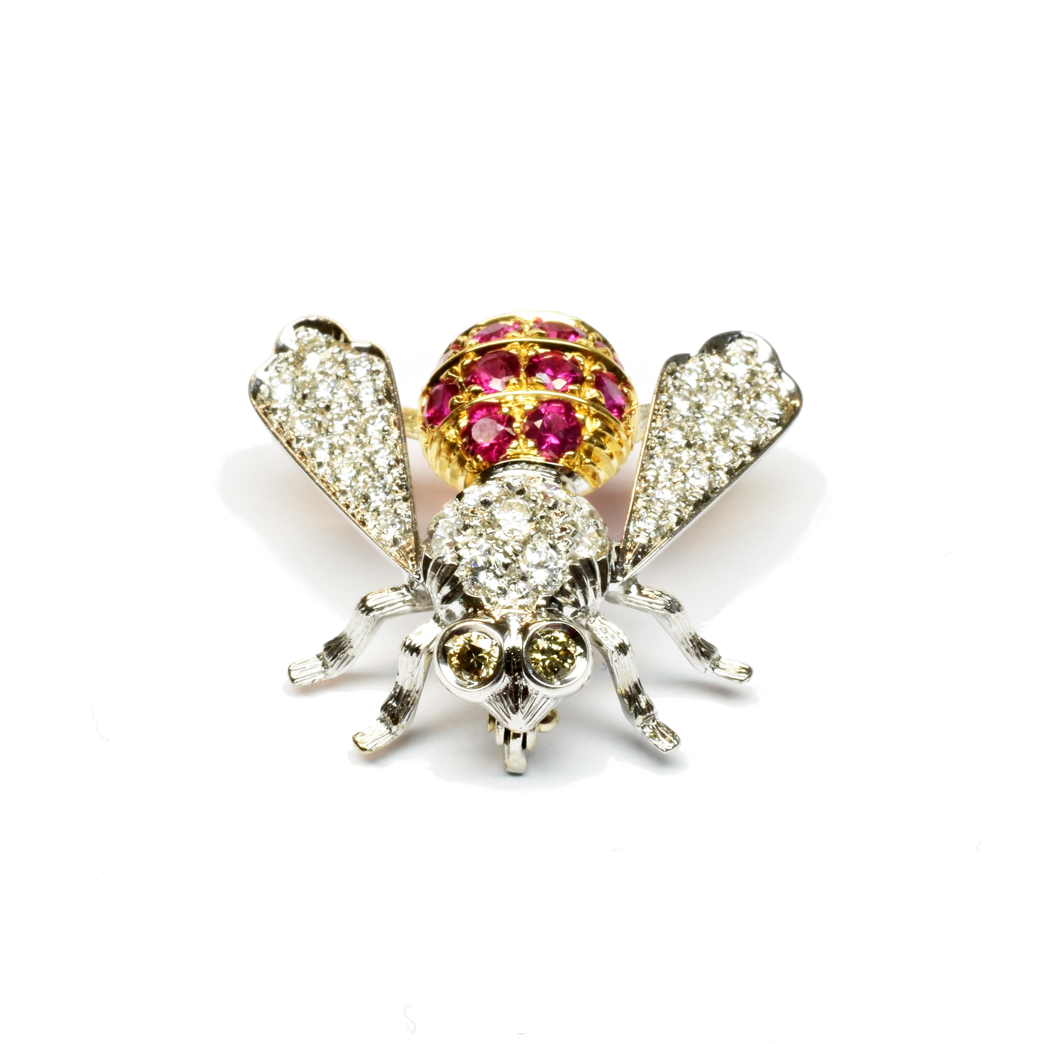 18 Kt Gold Bee Brooch with White Diamonds, Natural Pink Red Rubies and Champagne Diamonds Eyes.
Handmade in our Atelier in Valenza Italy.
Looks perfect on a Business Jacket or on a Cocktail Dress. 
This nice Brooch can be made in any combination of