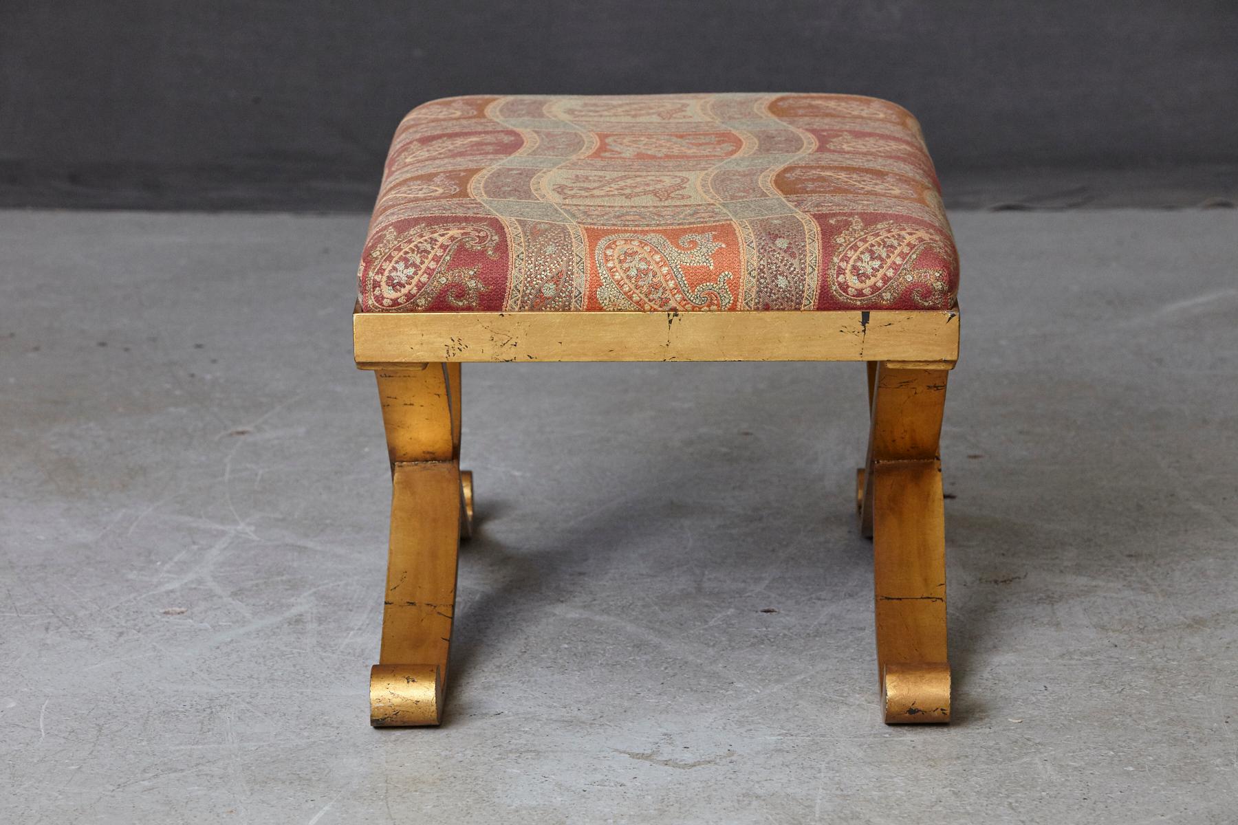 Modern Gild Patinated Metal Bench with Cross Legs Upholstered in Paisley Fabric