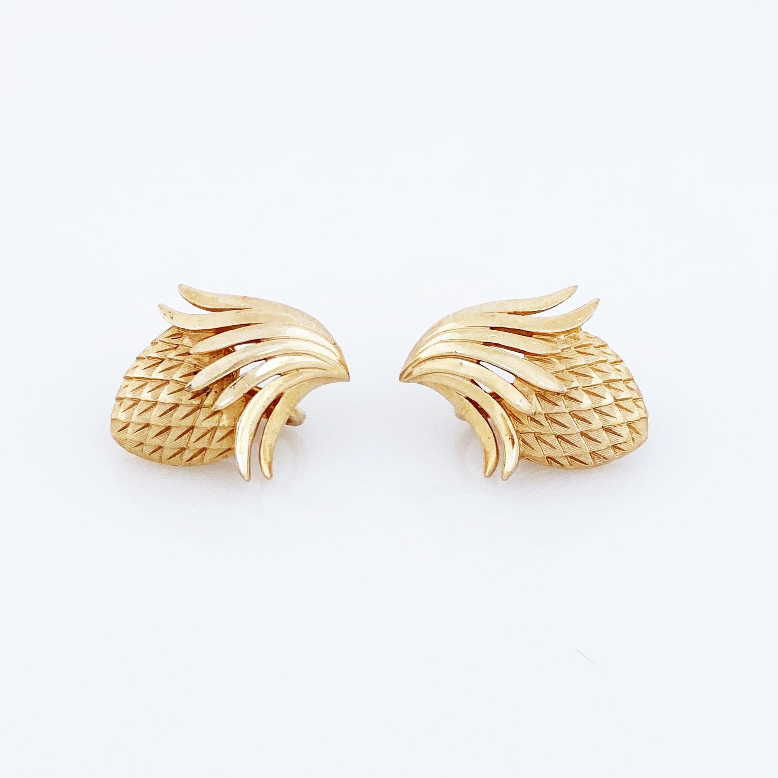 - Objet ancien

- Chaque boucle d'oreille mesure 1
