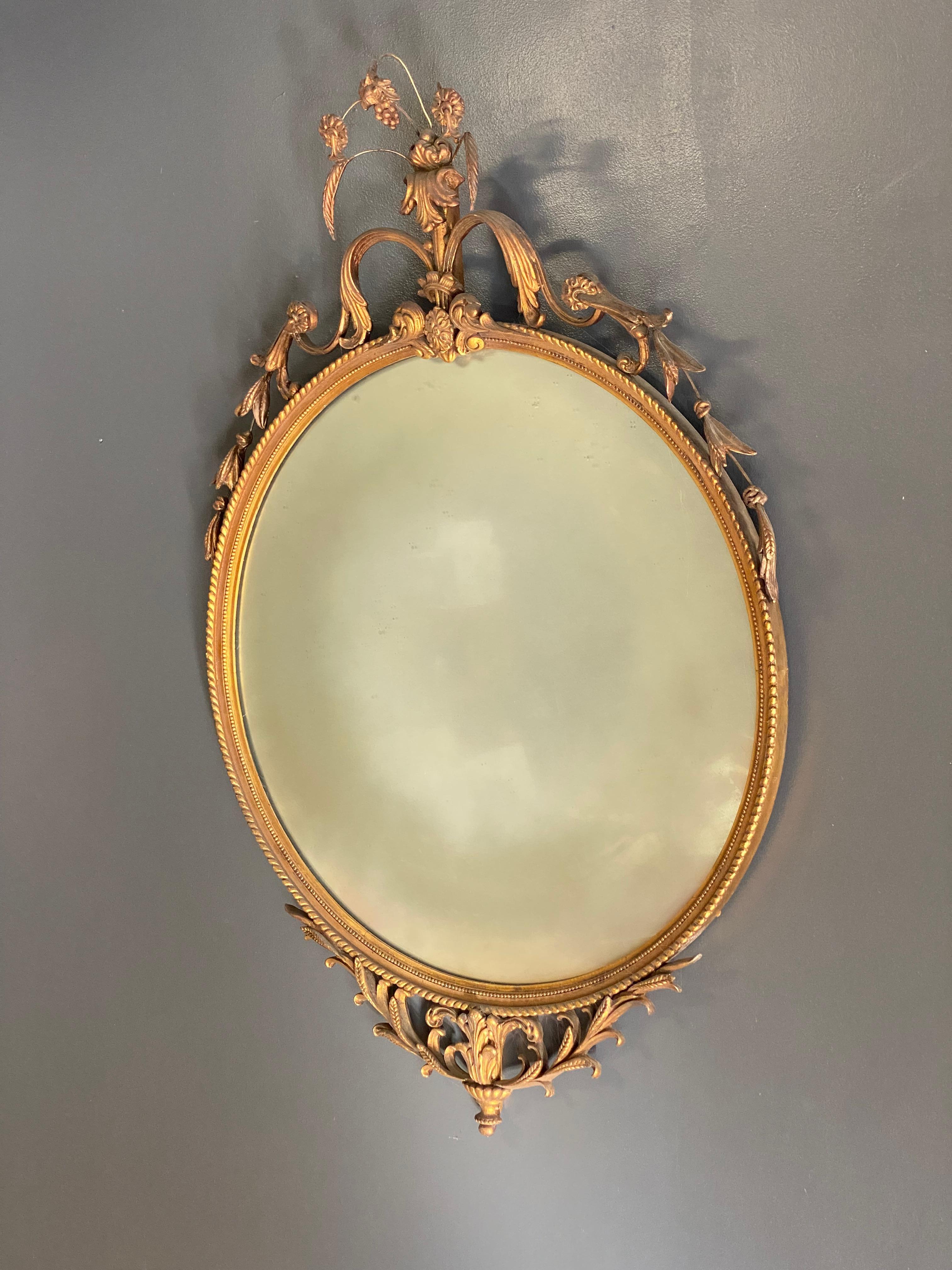 American Gilded 1930s Adams Style Floral and Scroll Mirror