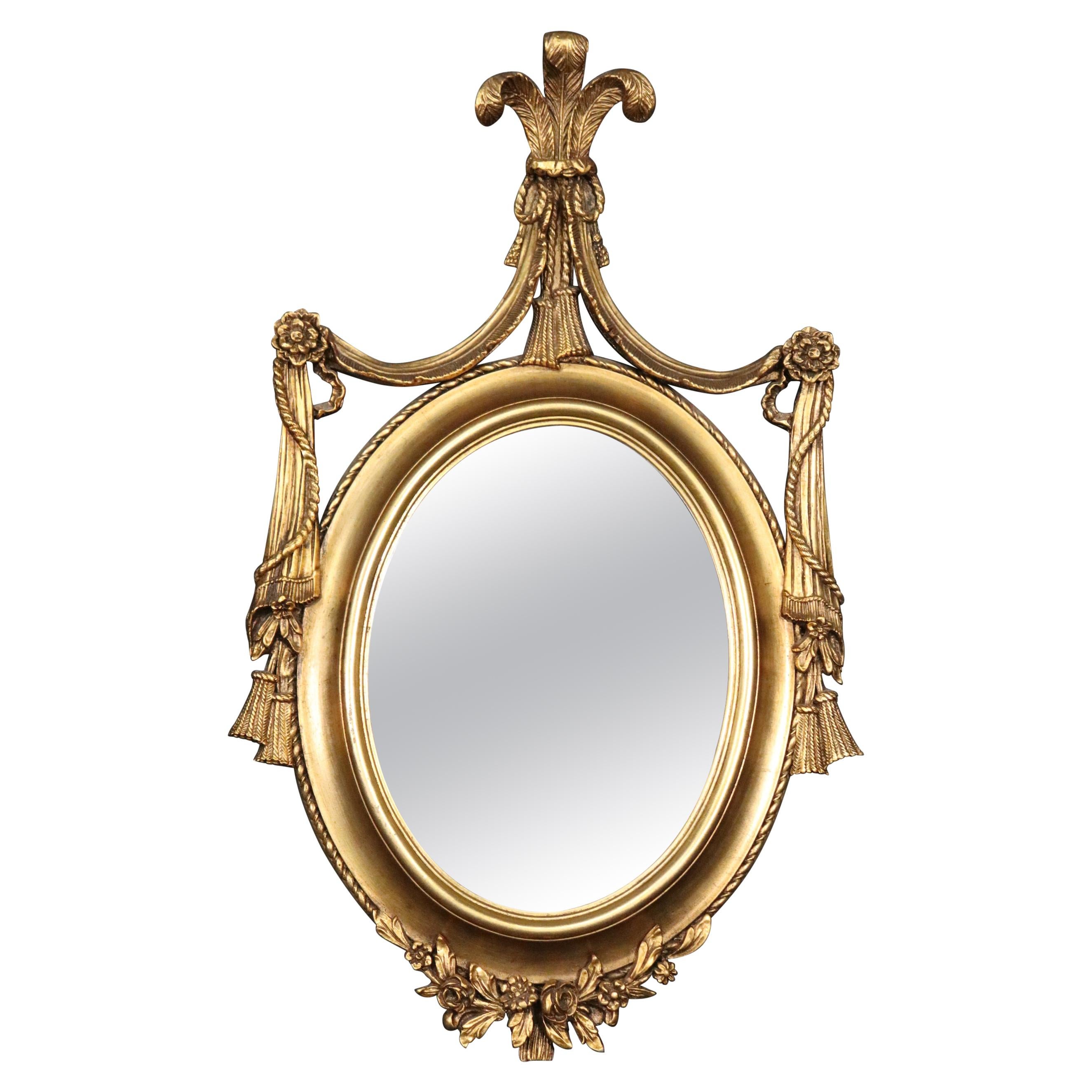 Gilded Adams Style Oval Mirror with Decorative Elements