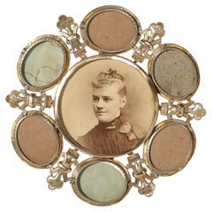 Cadre photo rond en verre et laiton de l'époque dorée