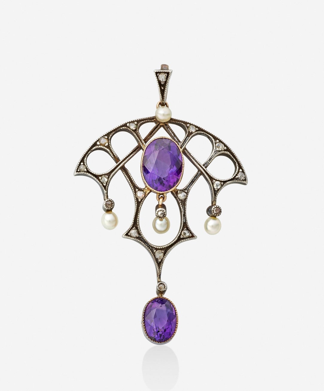 Indulge in an exquisite Siberian Amethyst, Rose Cut Diamond and Seed Pearl Pendant dating to the Gilded Age, circa 1890-1910.  The museum quality jewel has the most stunning gems set in Silver atop Pink Gold as was the custom of the period.  The