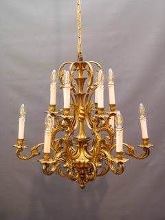 A large bronze chandelier from the workshops of Maison Lucien Gau Paris
