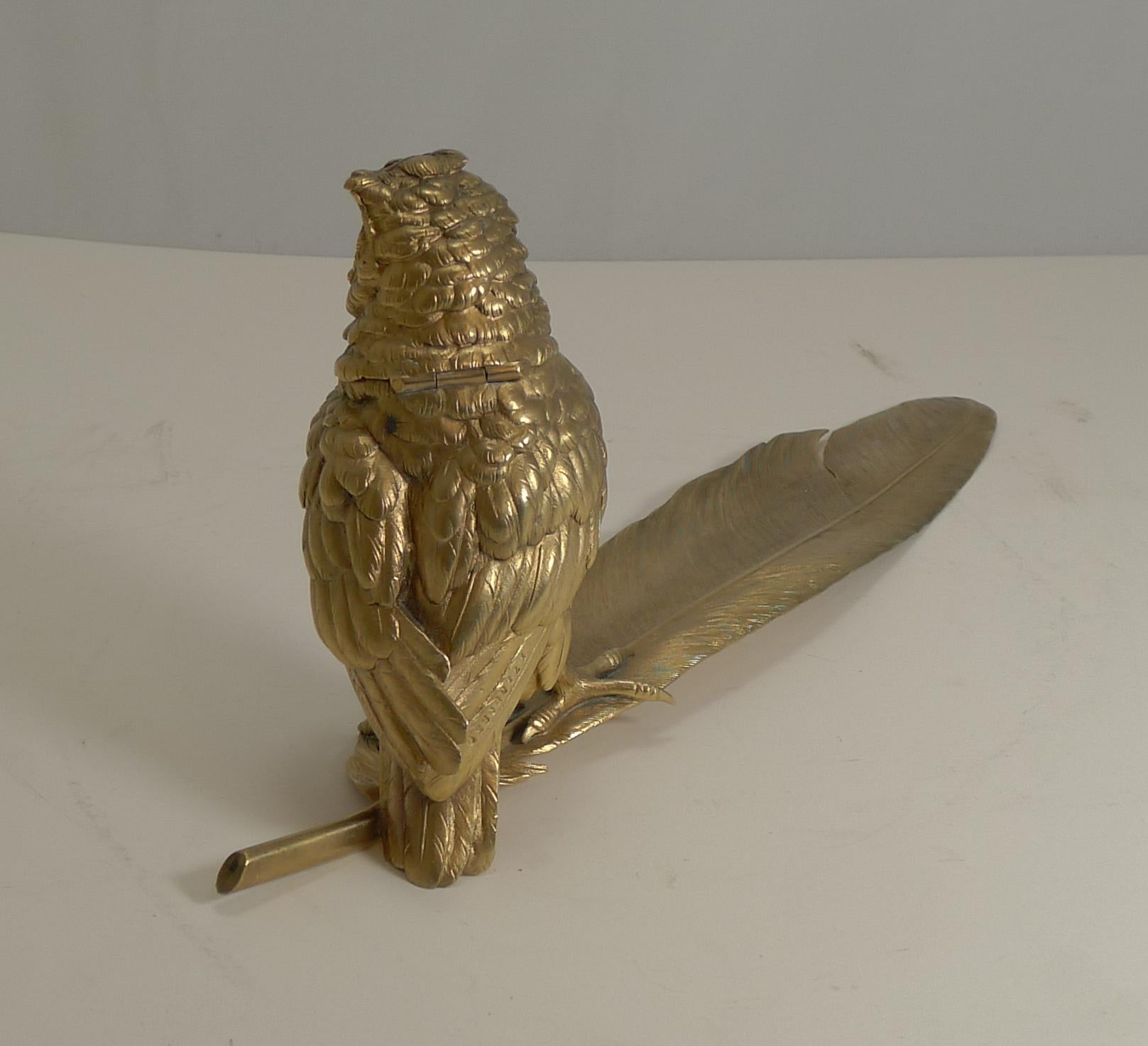 A magnificent and grand late Victorian Austrian desk set, made from cast bronze, beautifully finished in gold.

The cast Owl is a figural inkwell with a hinged lid revealing a glass ink chamber within. This is attached to a beautifully executed