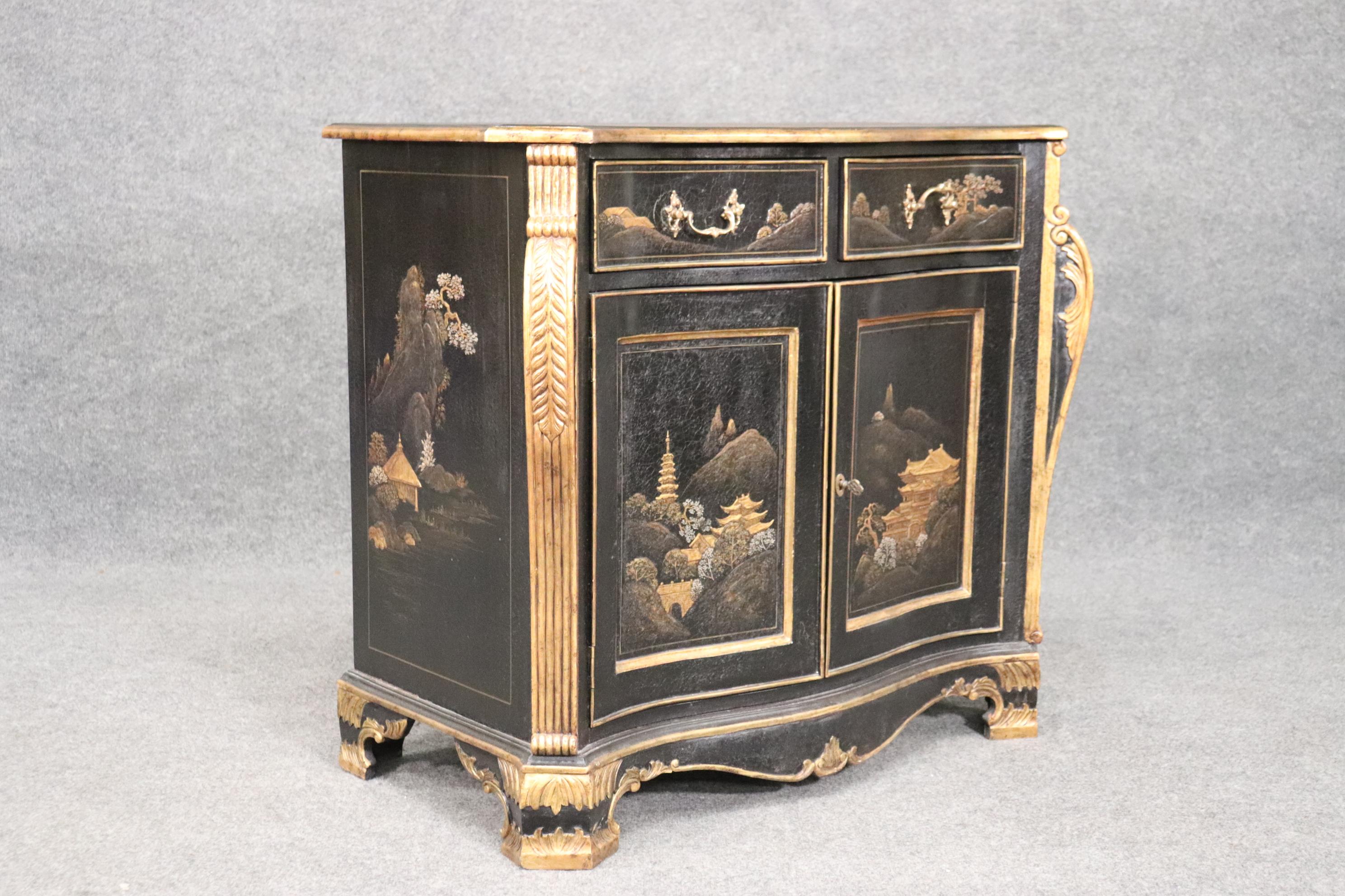 This is an antique and beautifully painted georgian style cabinet. This piece can be used as a server, a commode or just for a beautiful way to provide extra storage in any room. The piece has its original finish and is in good antique condition.