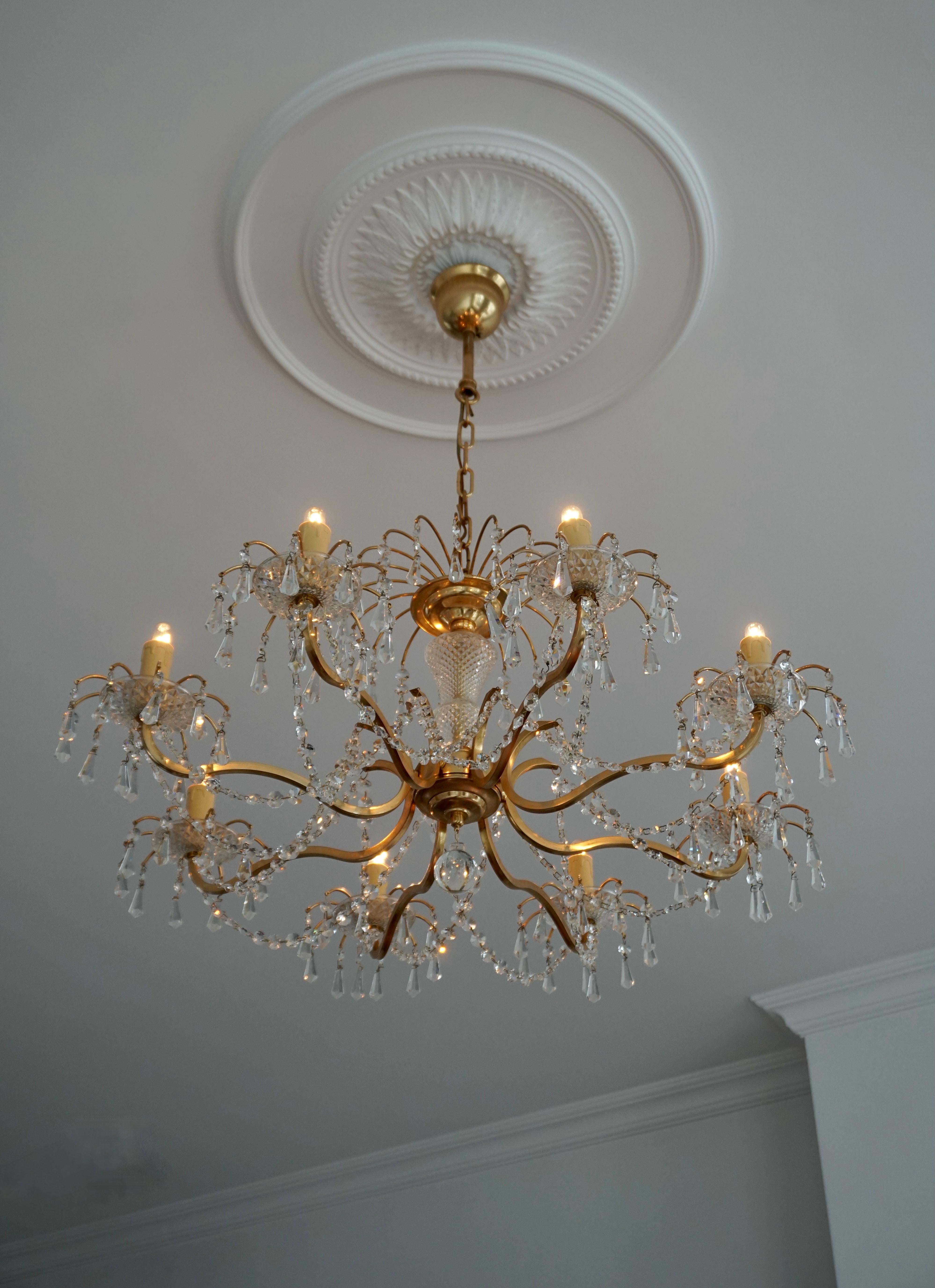 20th Century Gilded Brass and Crystal Chandelier For Sale