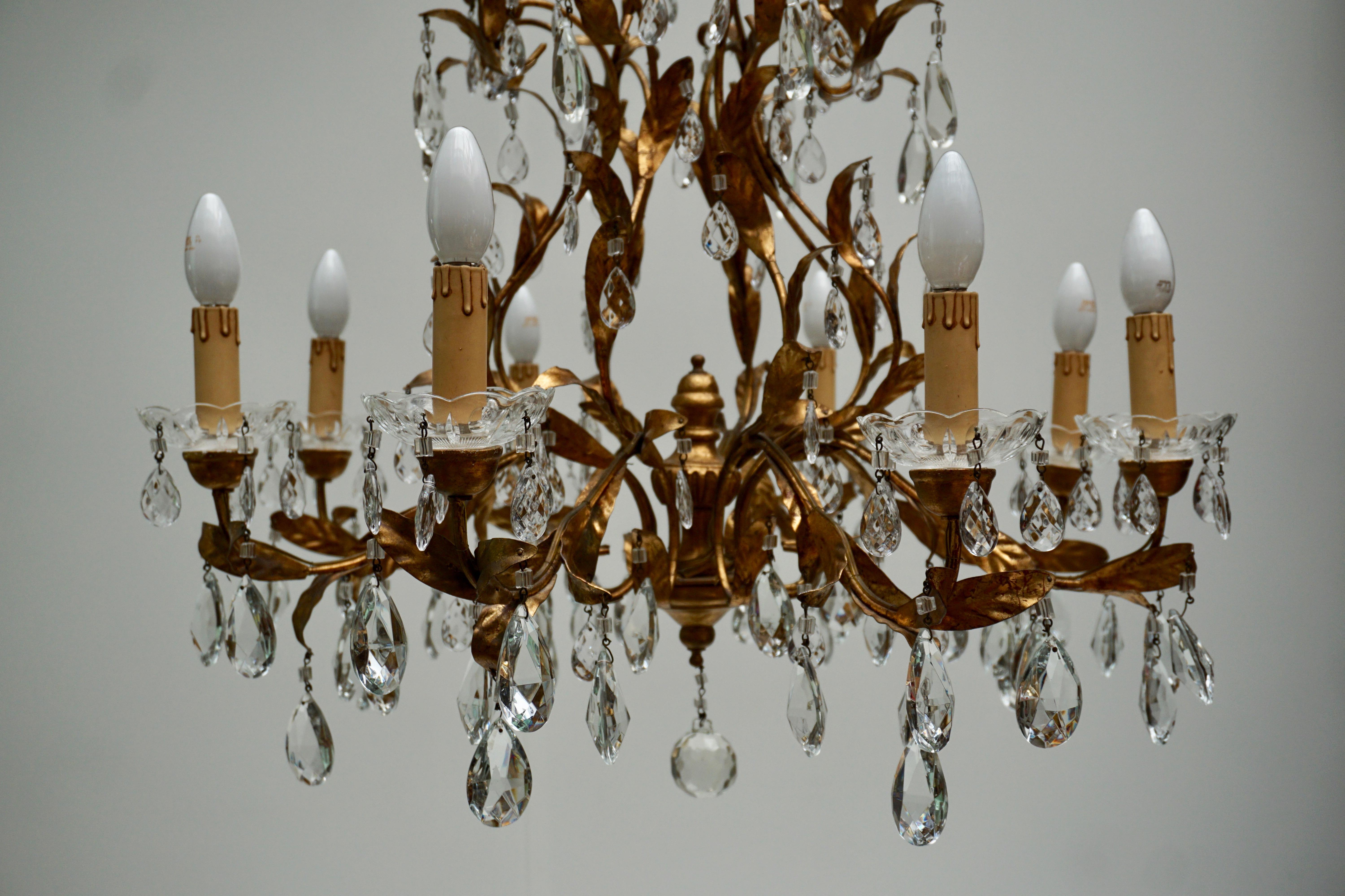20th Century Gilded Brass Eight-Light Chandelier with Leaves and Crystal For Sale