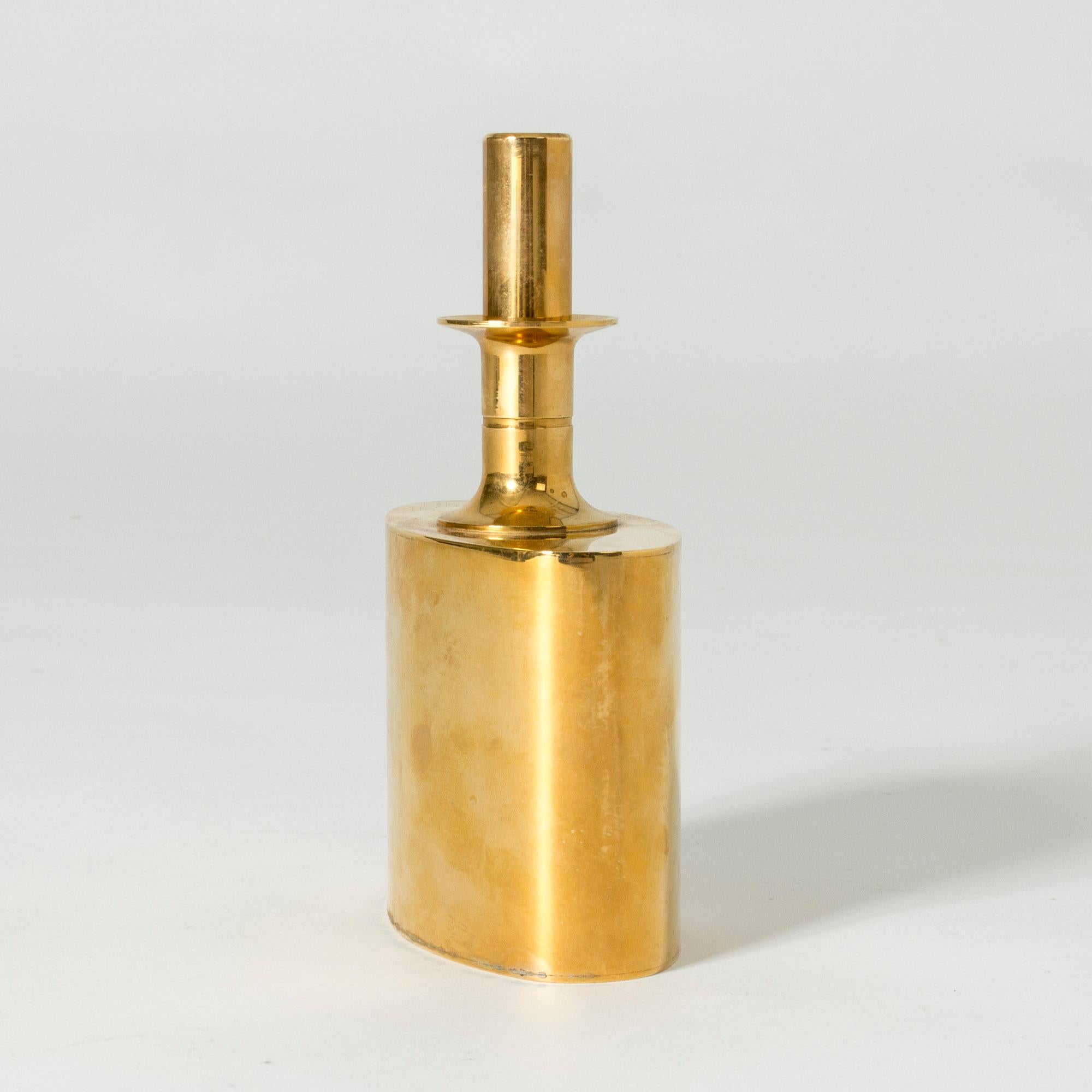 Gilded brass flask by Pierre Forssell with a beautiful warm sheen. Nice and heavy brass stopper.
