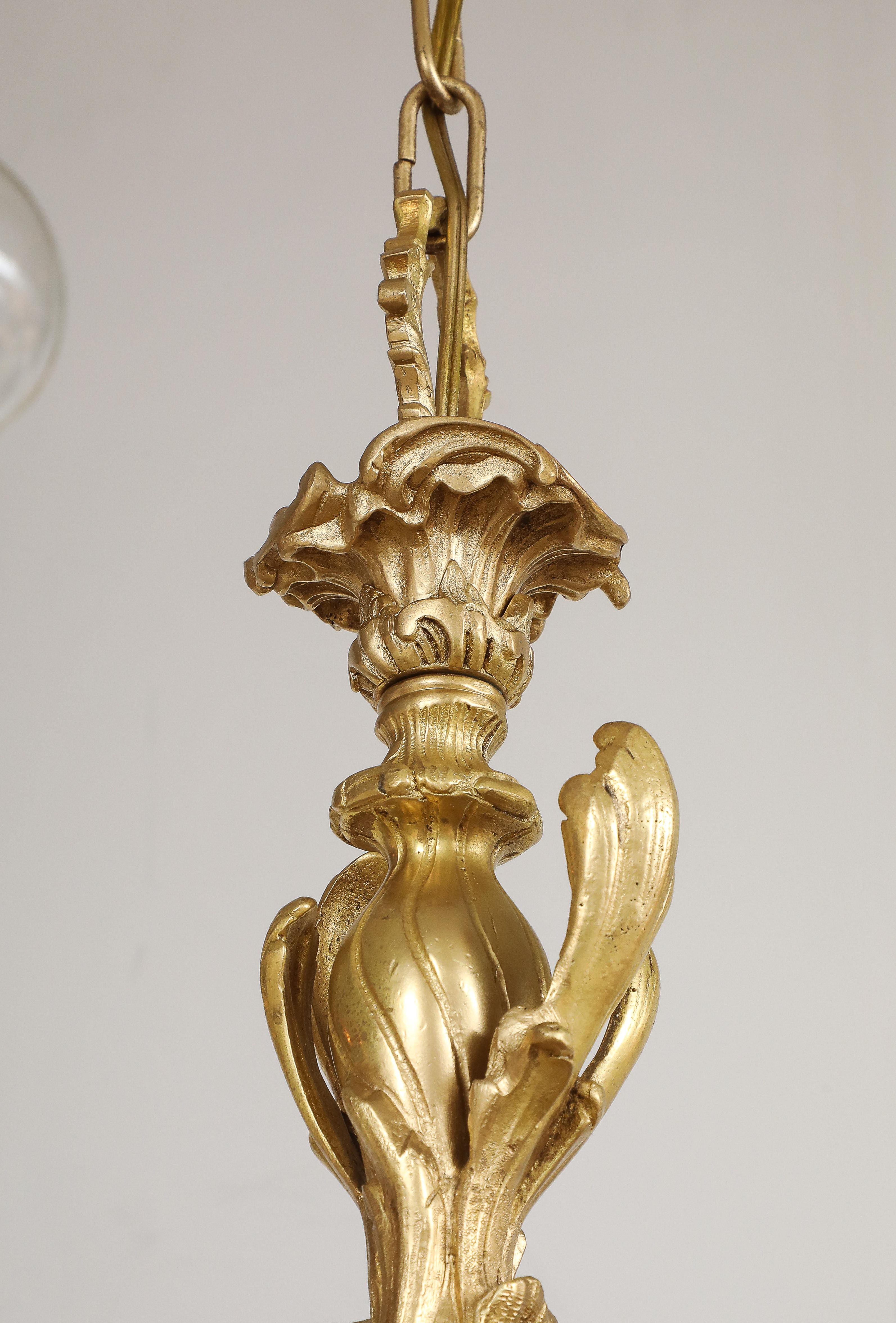 Lampadario in stile Reggenza a 10 bracci in bronzo dorato proveniente dalla Spagna in vendita 3