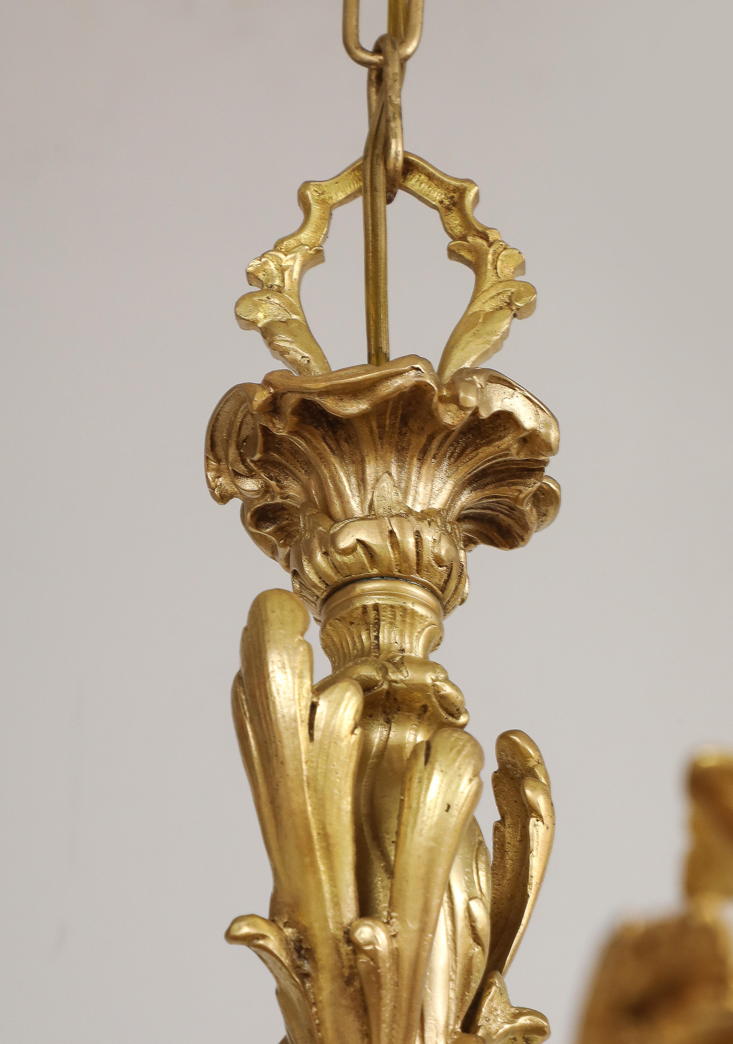 Lampadario in stile Reggenza a 10 bracci in bronzo dorato proveniente dalla Spagna in vendita 4