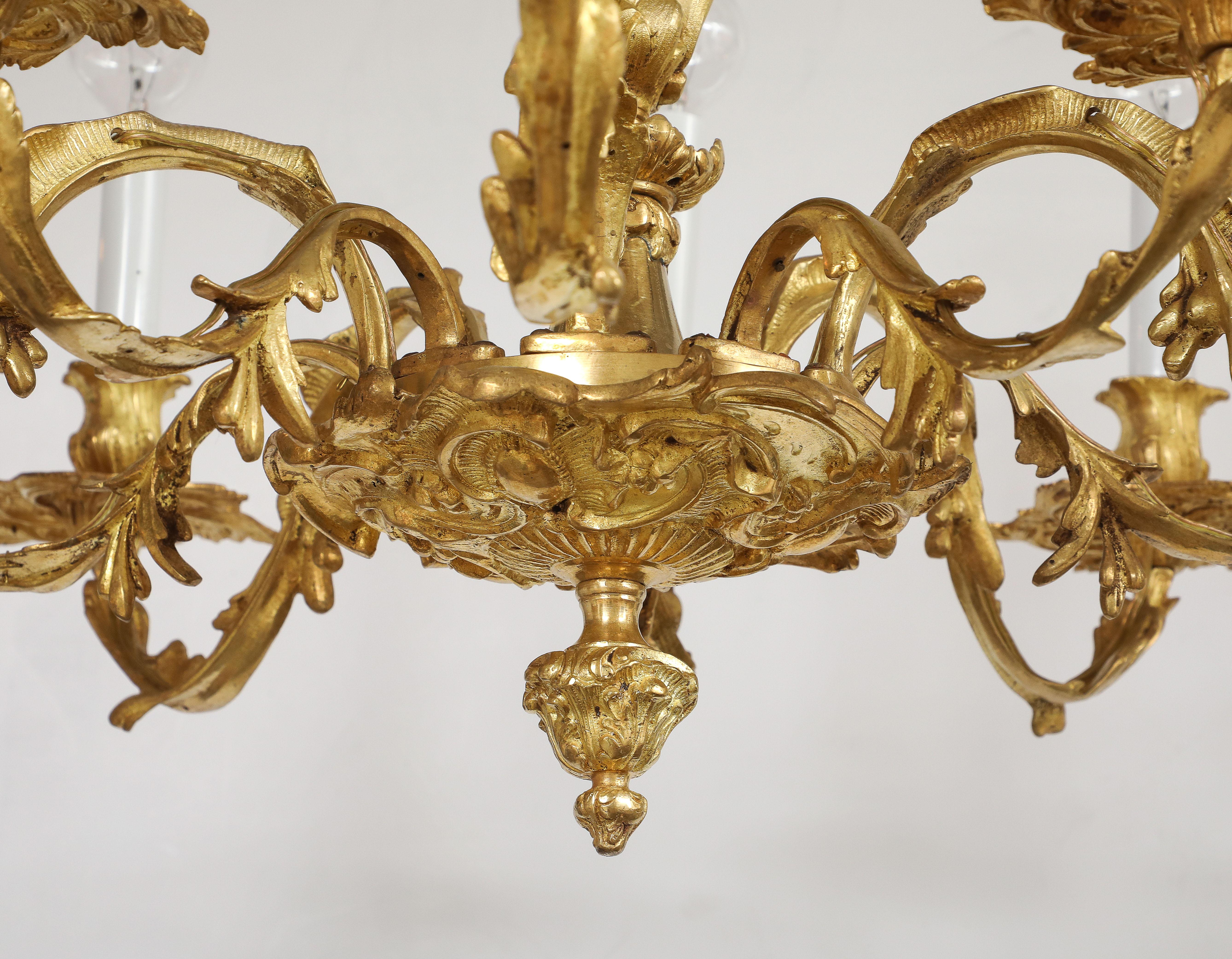 Spagnolo Lampadario in stile Reggenza a 10 bracci in bronzo dorato proveniente dalla Spagna in vendita