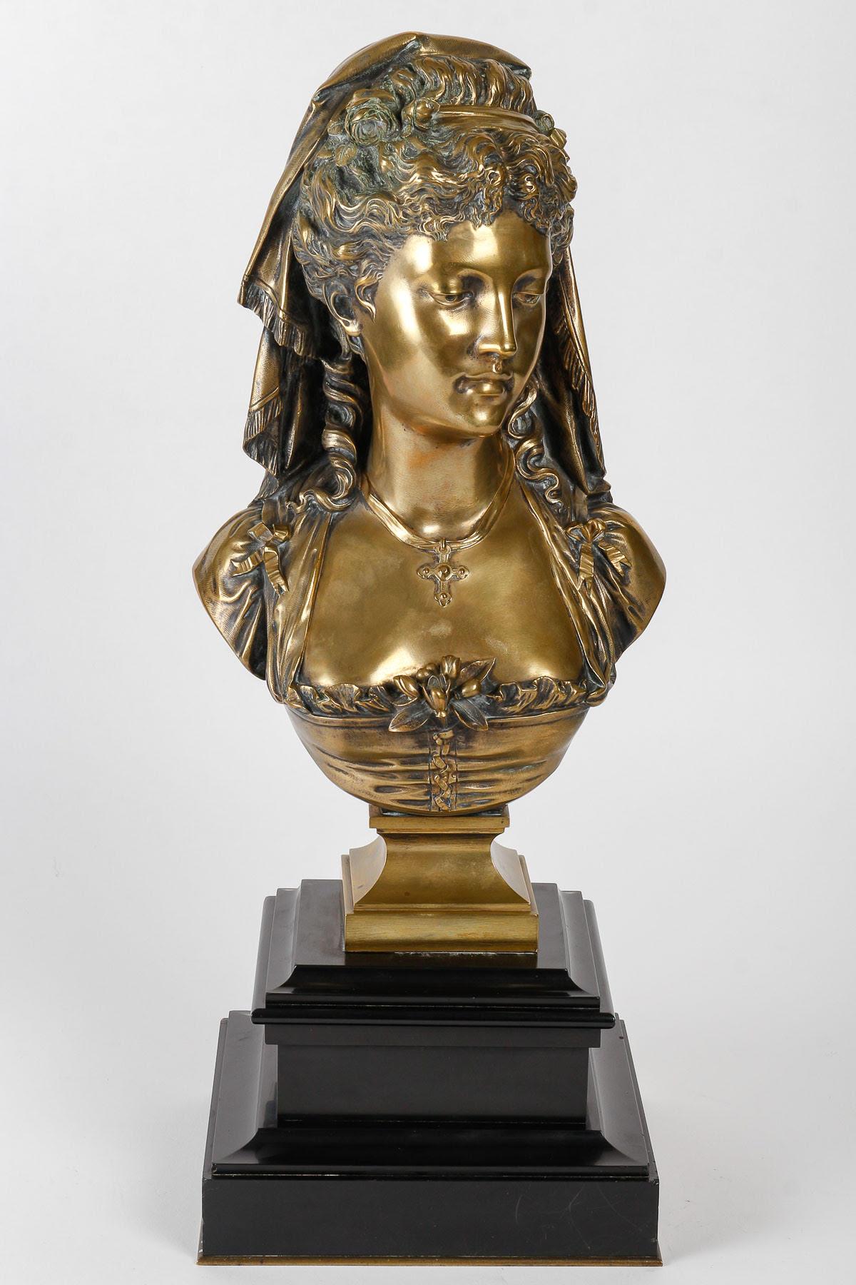 Gilded bronze bust of a courtesan by Eugène Antoine François Aizelin.

Bust of a courtesan by Eugène Antoine François Aizelin ( 1821-1902 ), 19th century, gilt bronze and marble base, Napoleon III period.  
H: 51cm, W: 19cm, D: 19cm