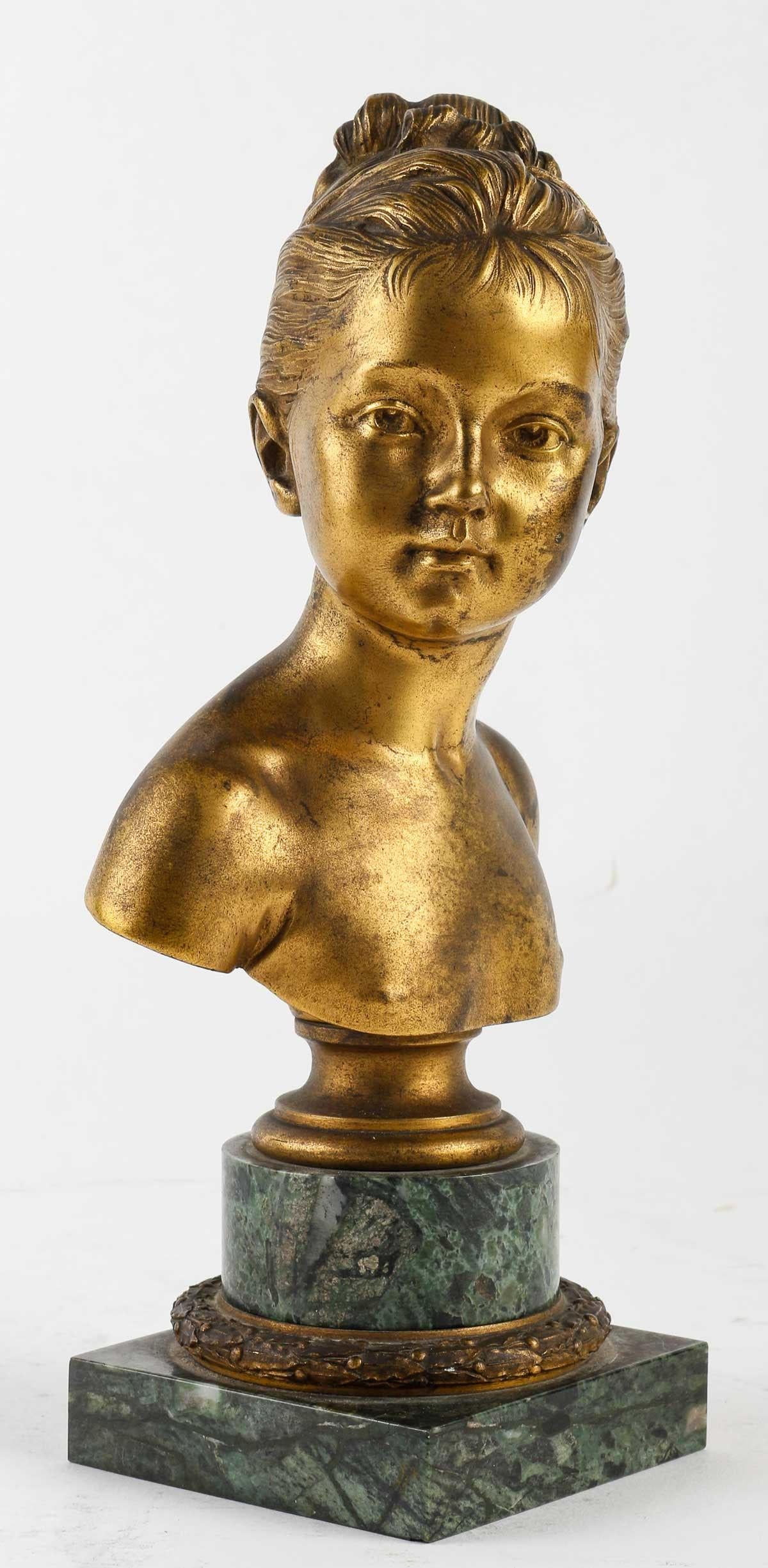 Gilded bronze bust of Louise Brongniart by Houdon.

Sculpture of a bust of Louise Brongniart by Jean-Antoine Houdon (1741-1828), reproduction of the XIXth century.    
h: 23cm , w: 11cm, d: 8cm