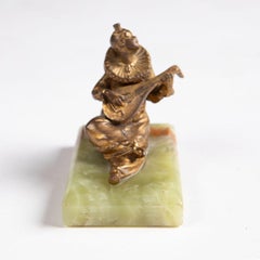 Gilded Bronze Cittern-Playing Clown on Onyx Base, Italy