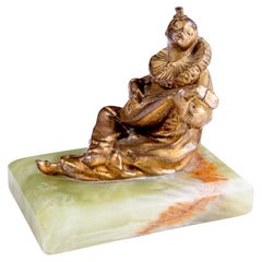 Gilded Bronze Cittern-Playing Clown on Onyx Base, Italy