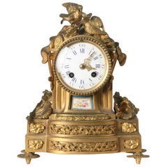 Gilded Bronze Clock in Louis XVI Style with Porcelain Plaques in Sevres Style