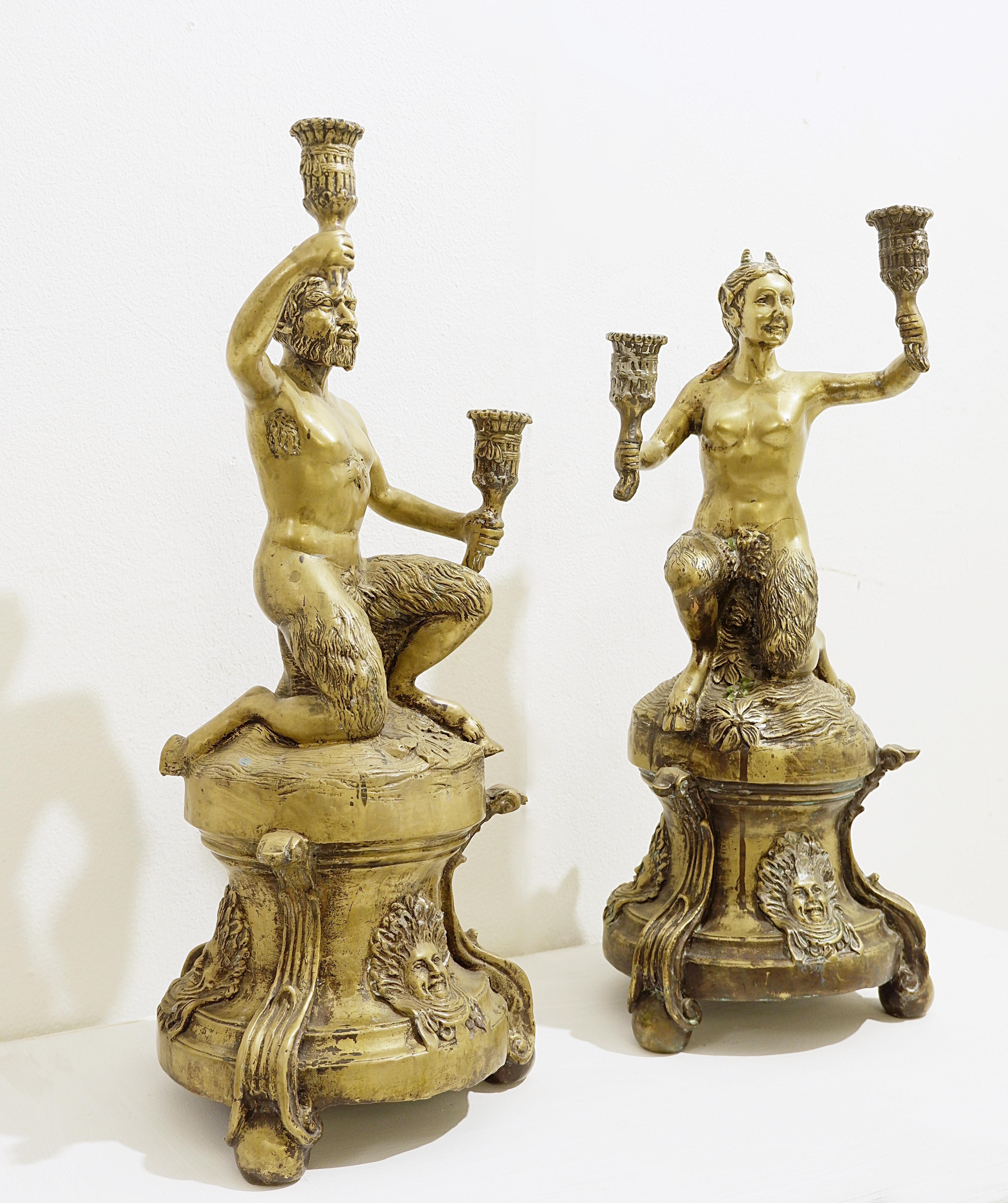 Gilded bronze satyr couple candle holders.