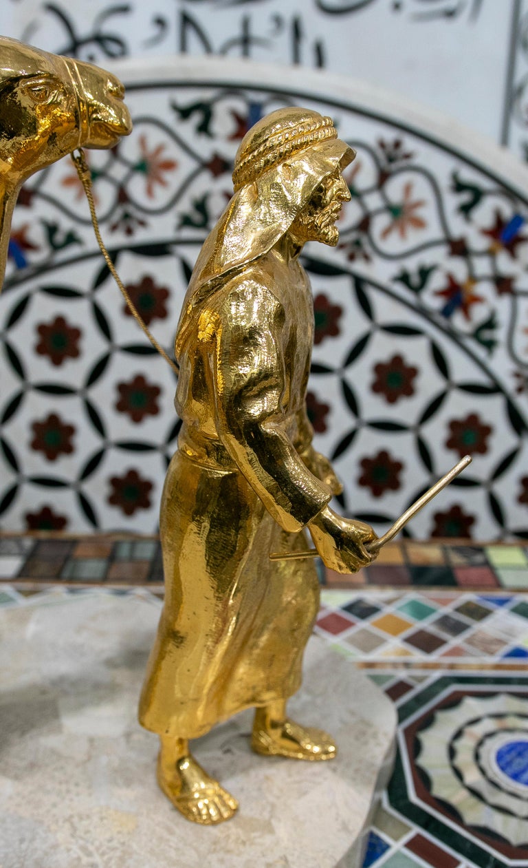 Gilded Bronze Sculpture with Marble Base of an Arabic Man with a Horse For Sale at 1stDibs