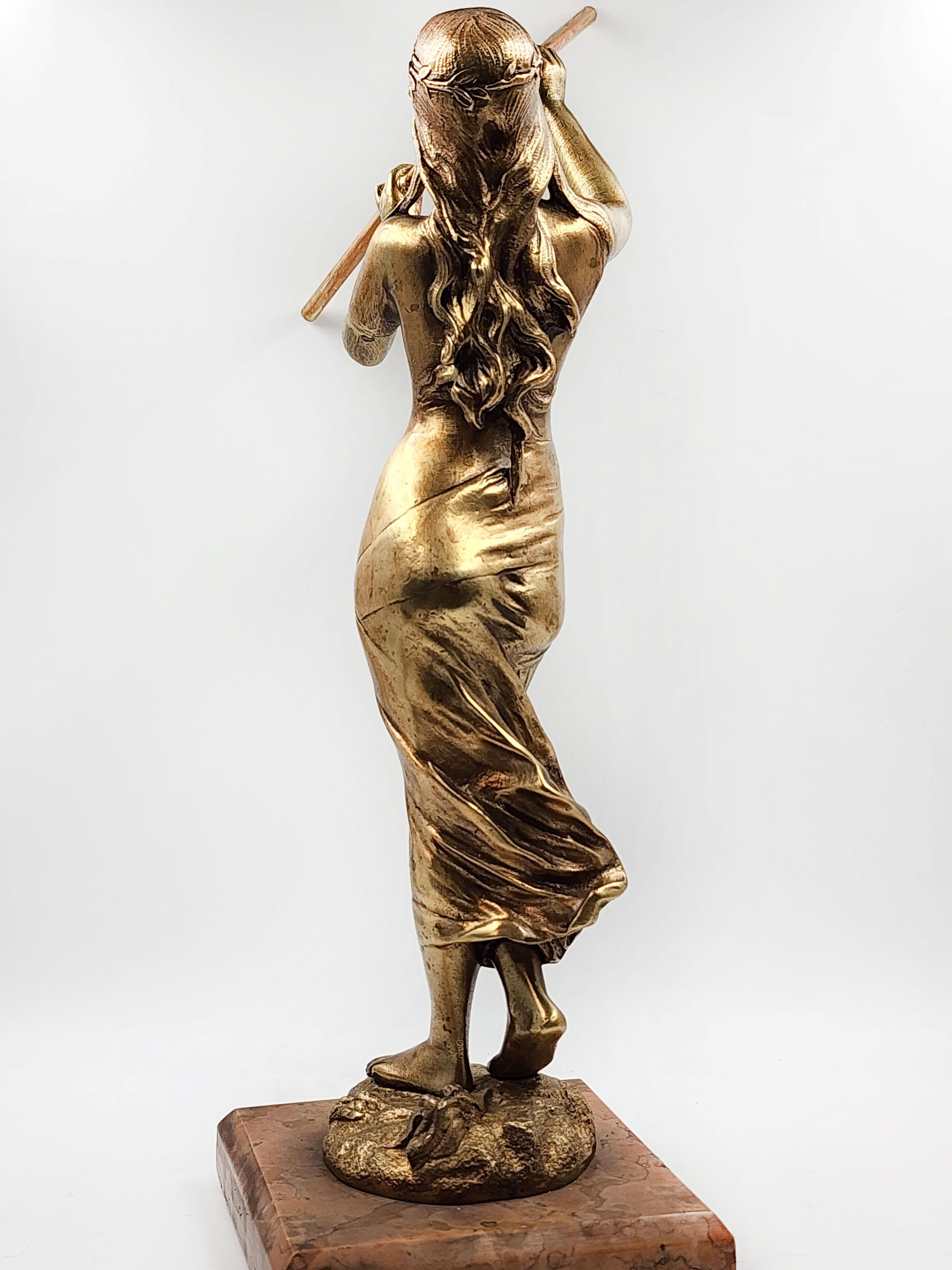 Gilded bronze sculpture with marble 