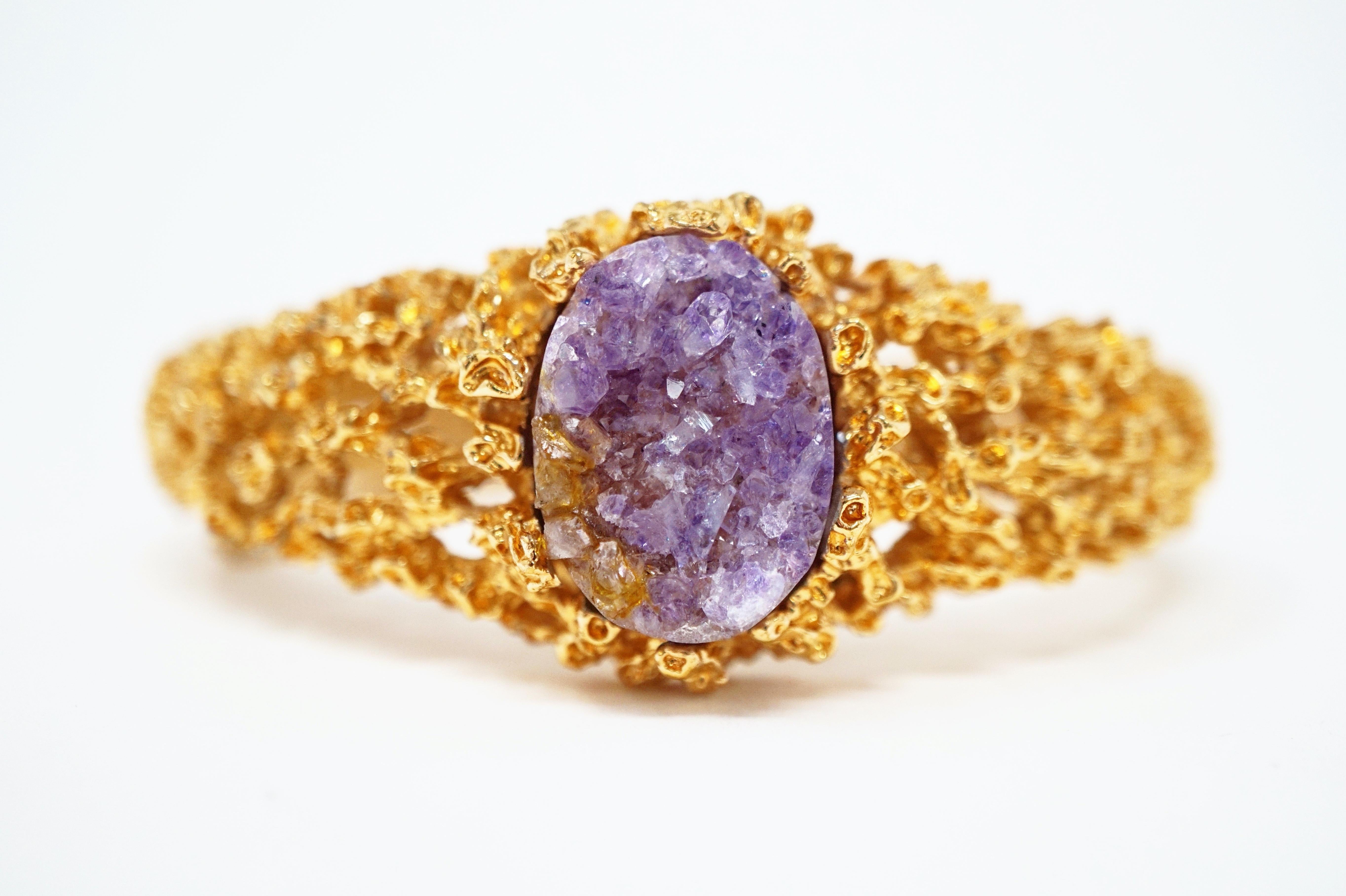 Exquisite gilt Brutalist-style abstract modern bracelet with Amethyst gemstone centerpiece by Panetta, circa 1960.  

ABOUT PANETTA:
Panetta was created in 1945 in New York by Beneditto Panetta, a jeweler from Naples, Italy. Panetta is a very