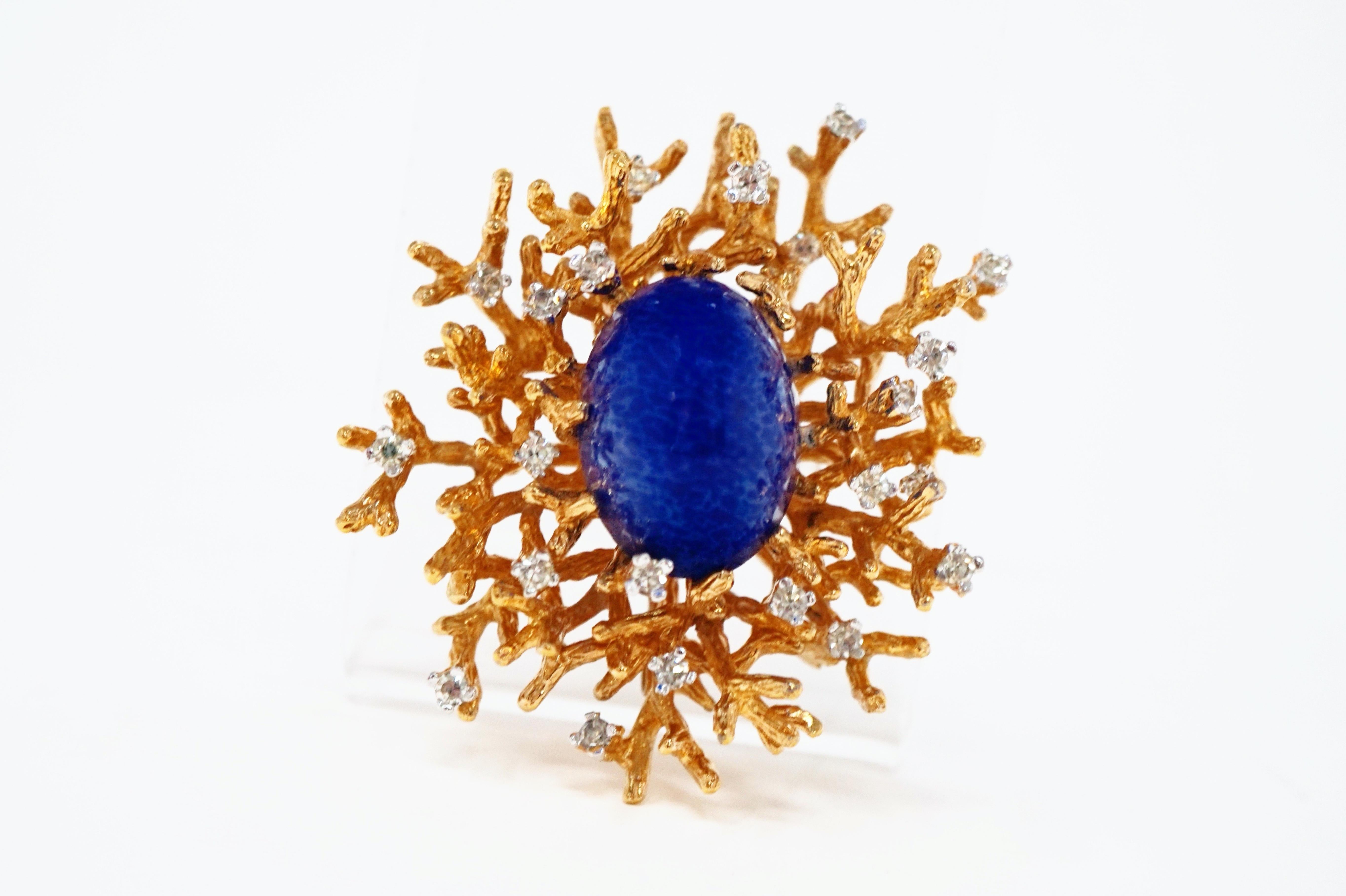 Exquisite gilt Brutalist-style abstract modern brooch with faux Lapis Lazuli centerpiece and rhinestone accents by Panetta, circa 1960.  This gorgeous piece will be a quick favorite in your vintage jewelry collection!

ABOUT PANETTA:
Panetta was