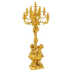 Gilded Candelabra with Cherubs and Dolphins