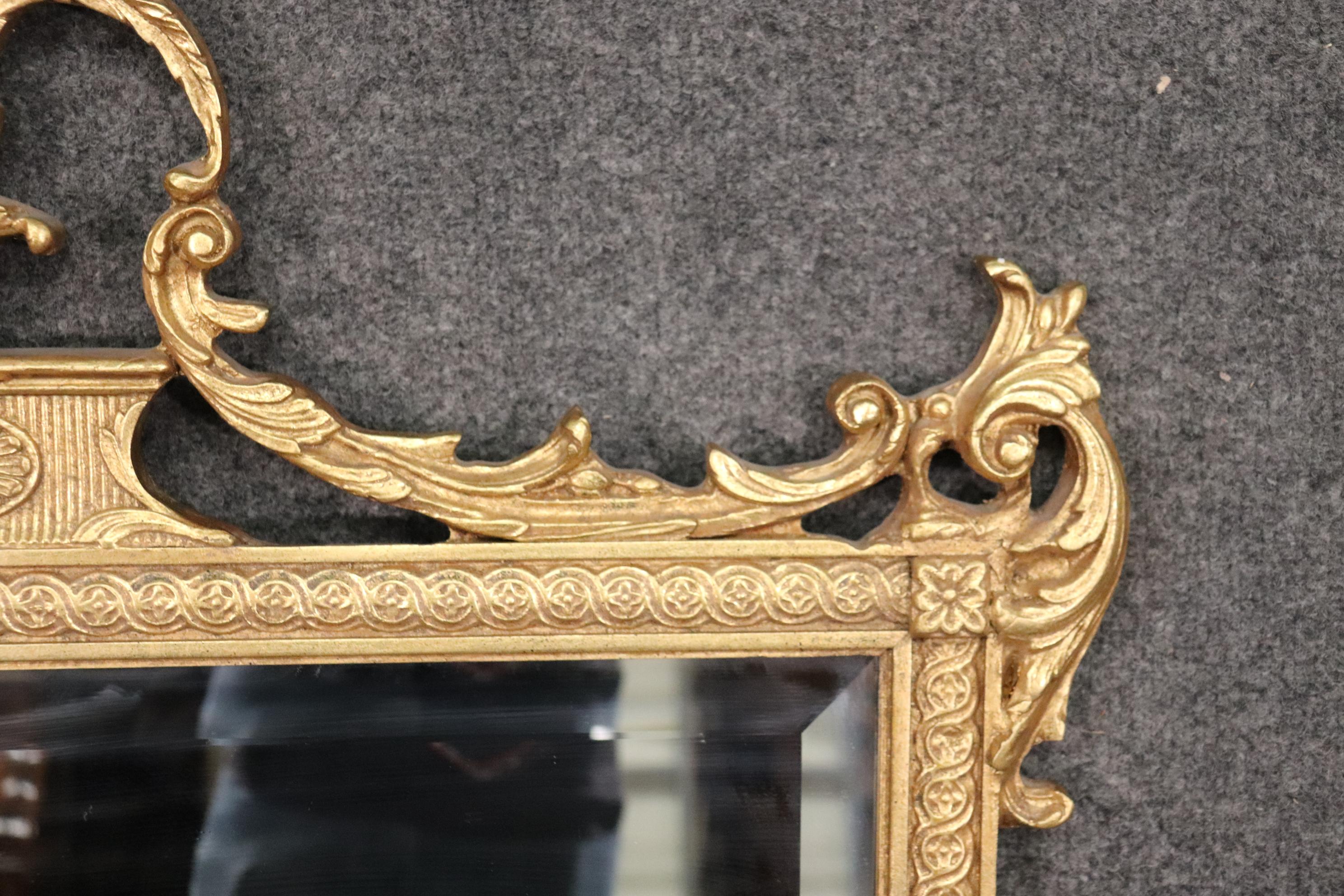 Late 20th Century Gilded Carved French Louis XV Style Decorative Arts Beveled Glass Mirror
