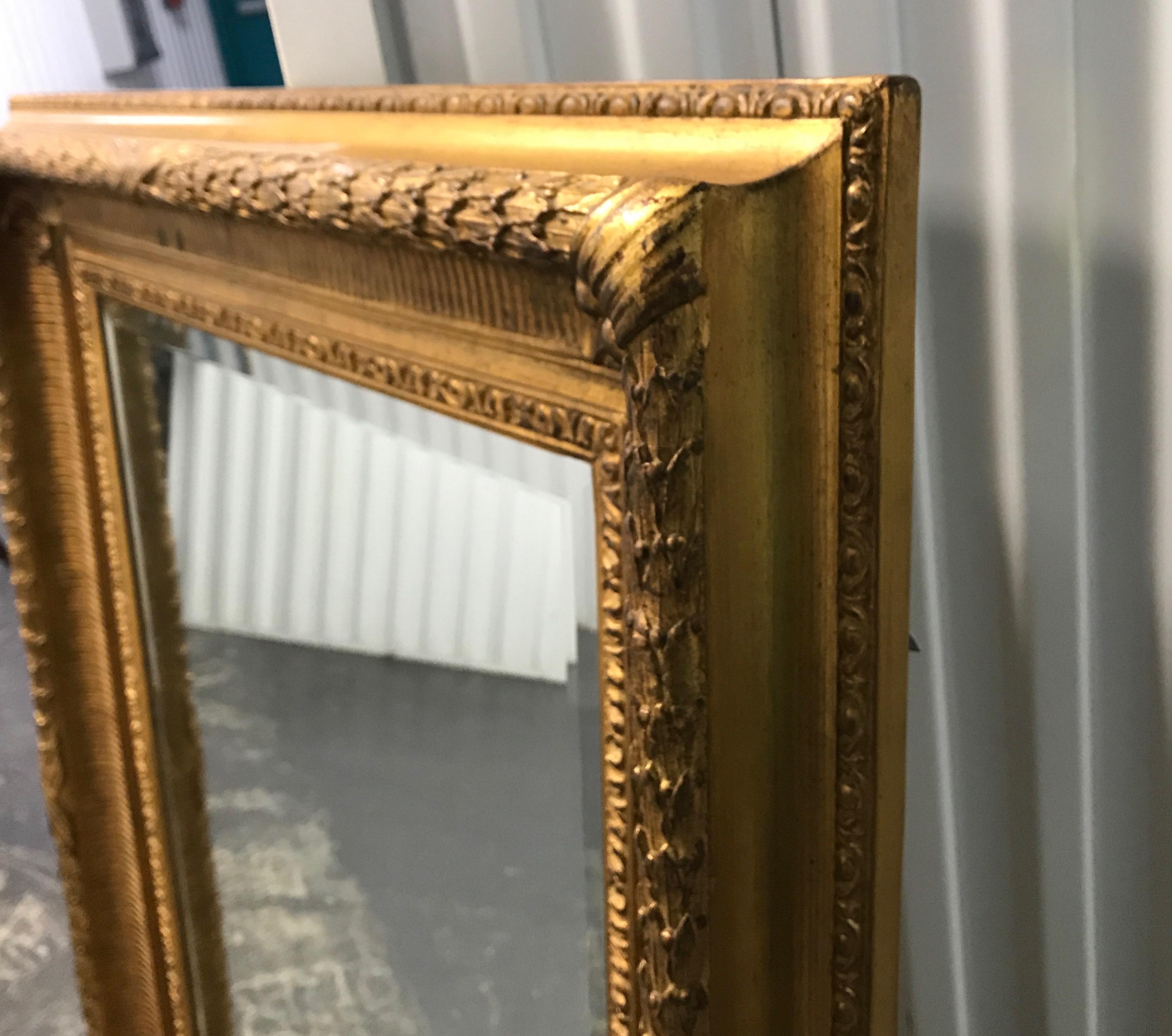 American Gilded Carver's Guild London Beveled Mirror For Sale