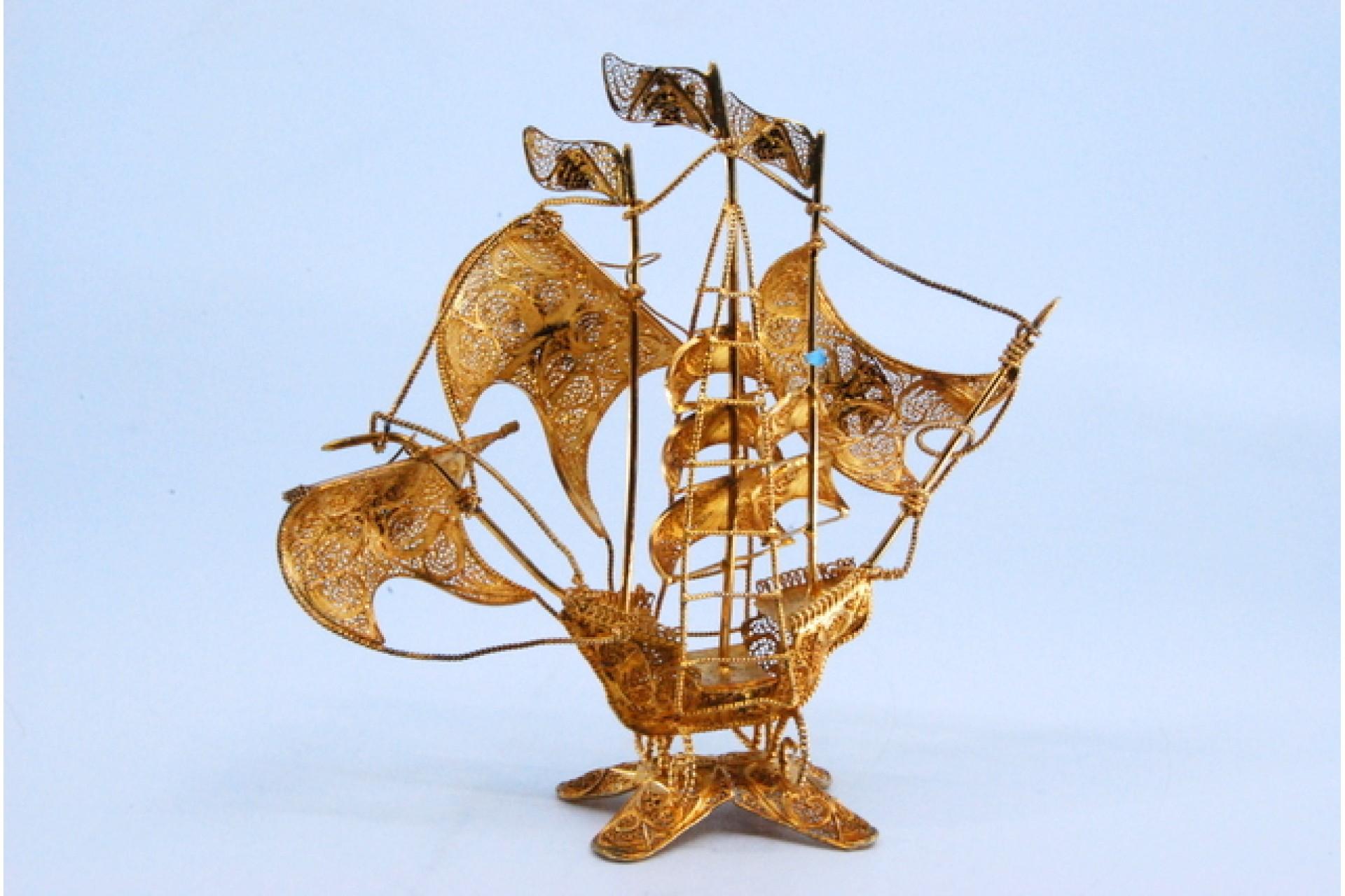 European Gilded filigree caravel with enameled crosses on cut-out base For Sale