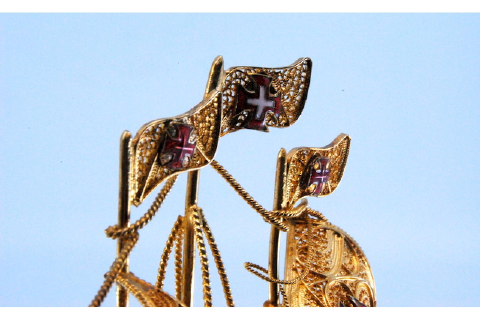 Silver Gilded filigree caravel with enameled crosses on cut-out base For Sale