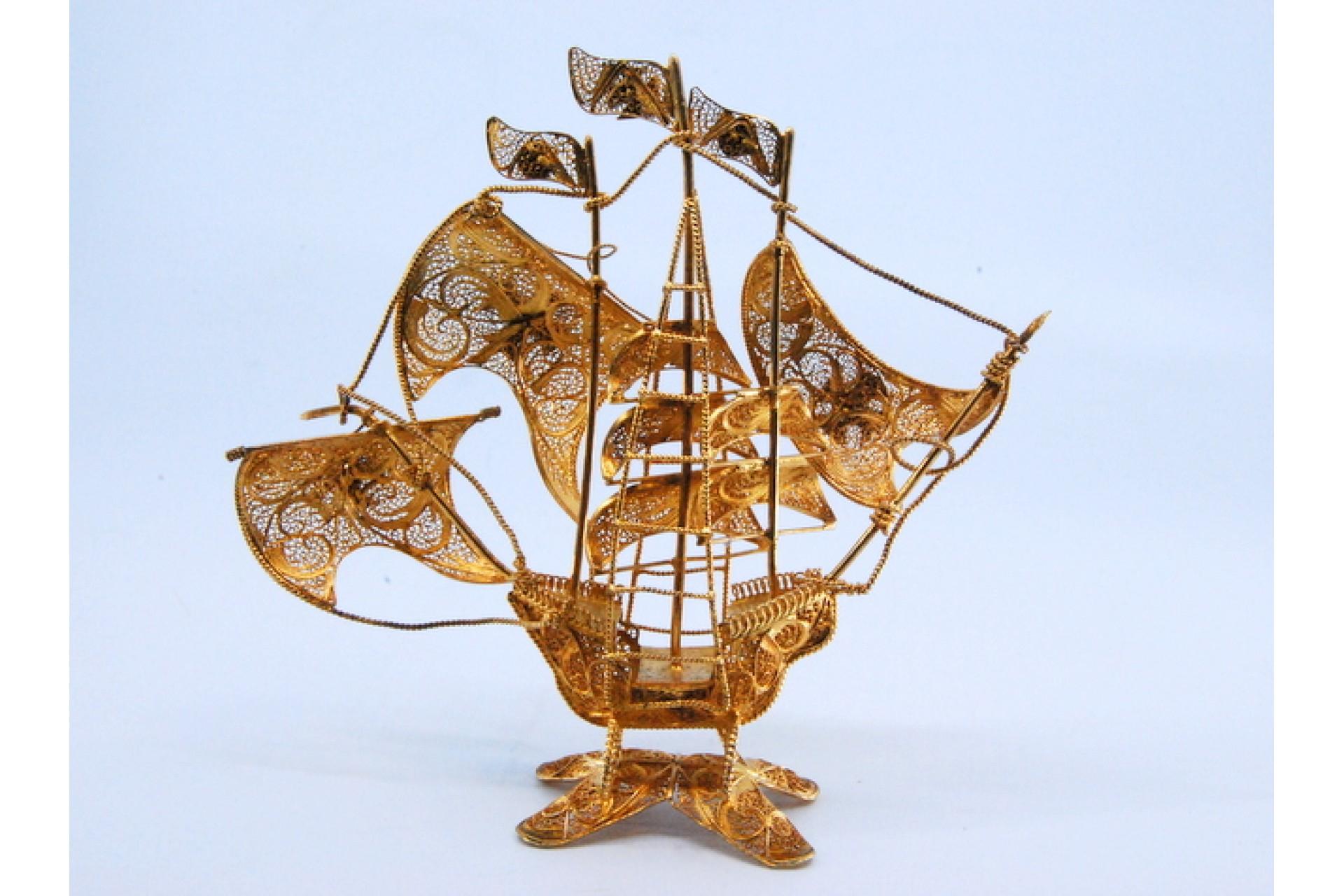 Gilded filigree caravel with enameled crosses on cut-out base For Sale 1