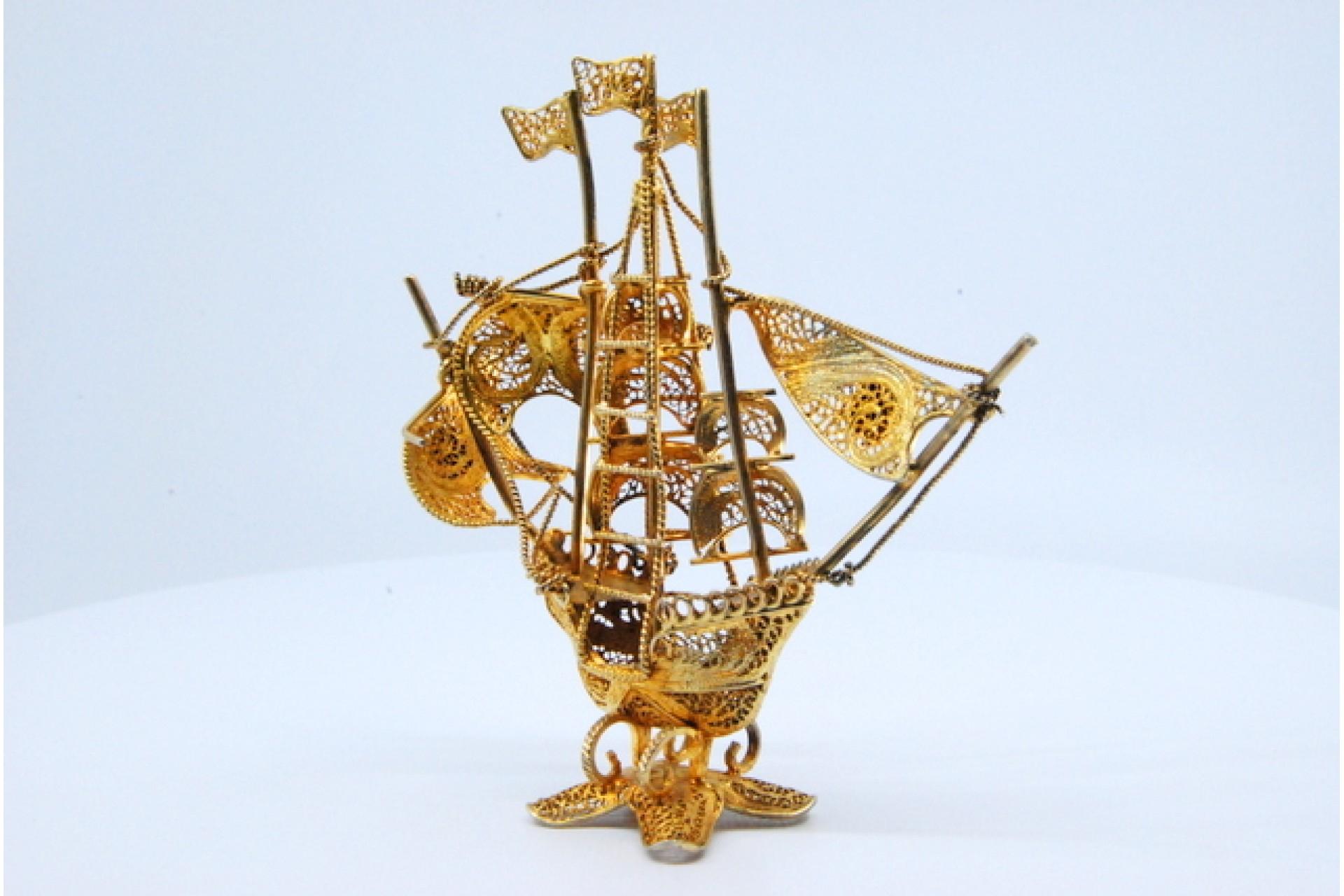 European Gilded filigree caravel with Portuguese arms on scalloped base For Sale