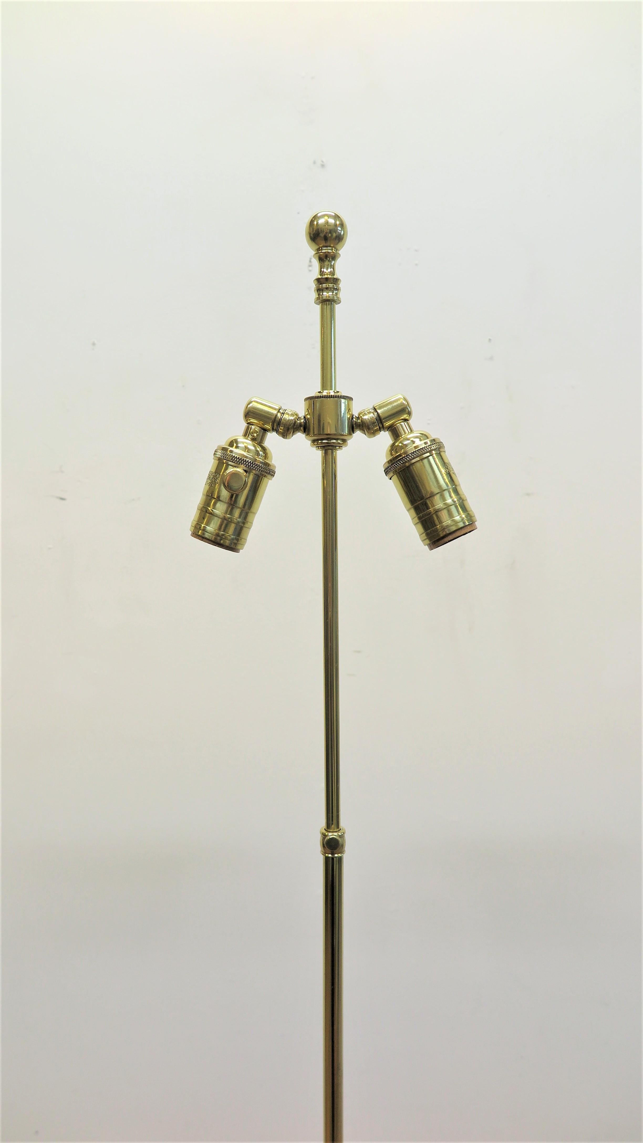 Albert Hadley Gilded Floor Lamp. Tripod adjustable gold leaf gilded floor lamp designed by Albert Hadley and Pairish Hadley Design. Pair available. These uncompleted Lamps where recovered from the closing of the metal fabricators. The bases and