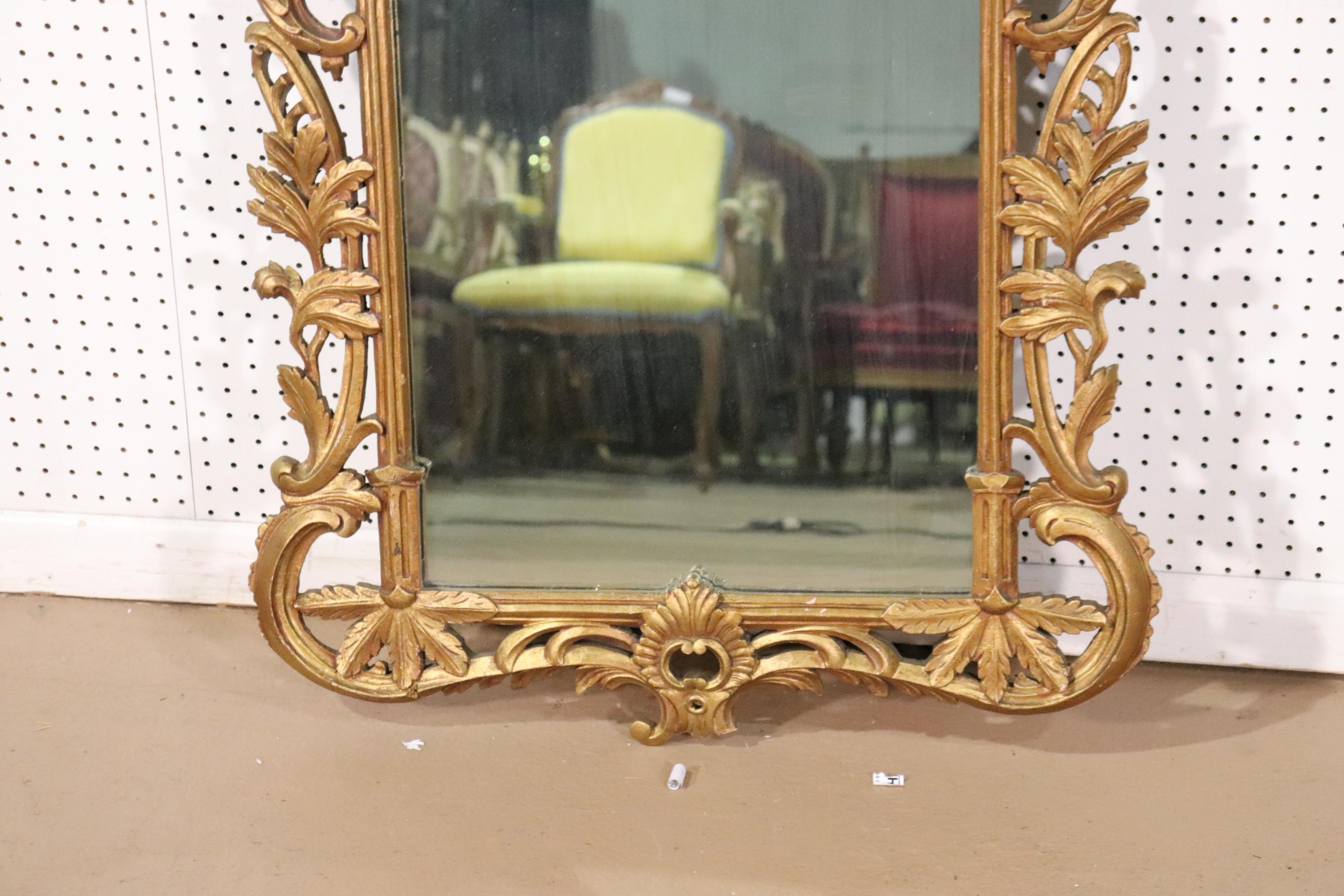 This is a beautiful wall mirror dating to the 1940s era. The mirror measures 42 tall x 32 wide. There is a small damage to the bottom which we will correct.
