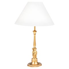 Gilded French table lamp with putti.