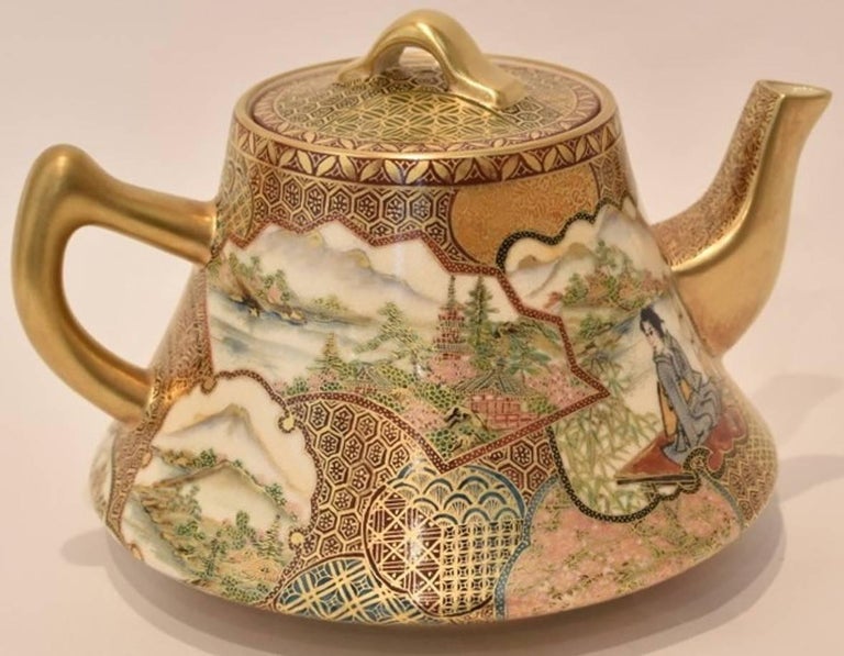 Gilded HandPainted ThreePiece Kutani Porcelain Tea Set, circa 1985