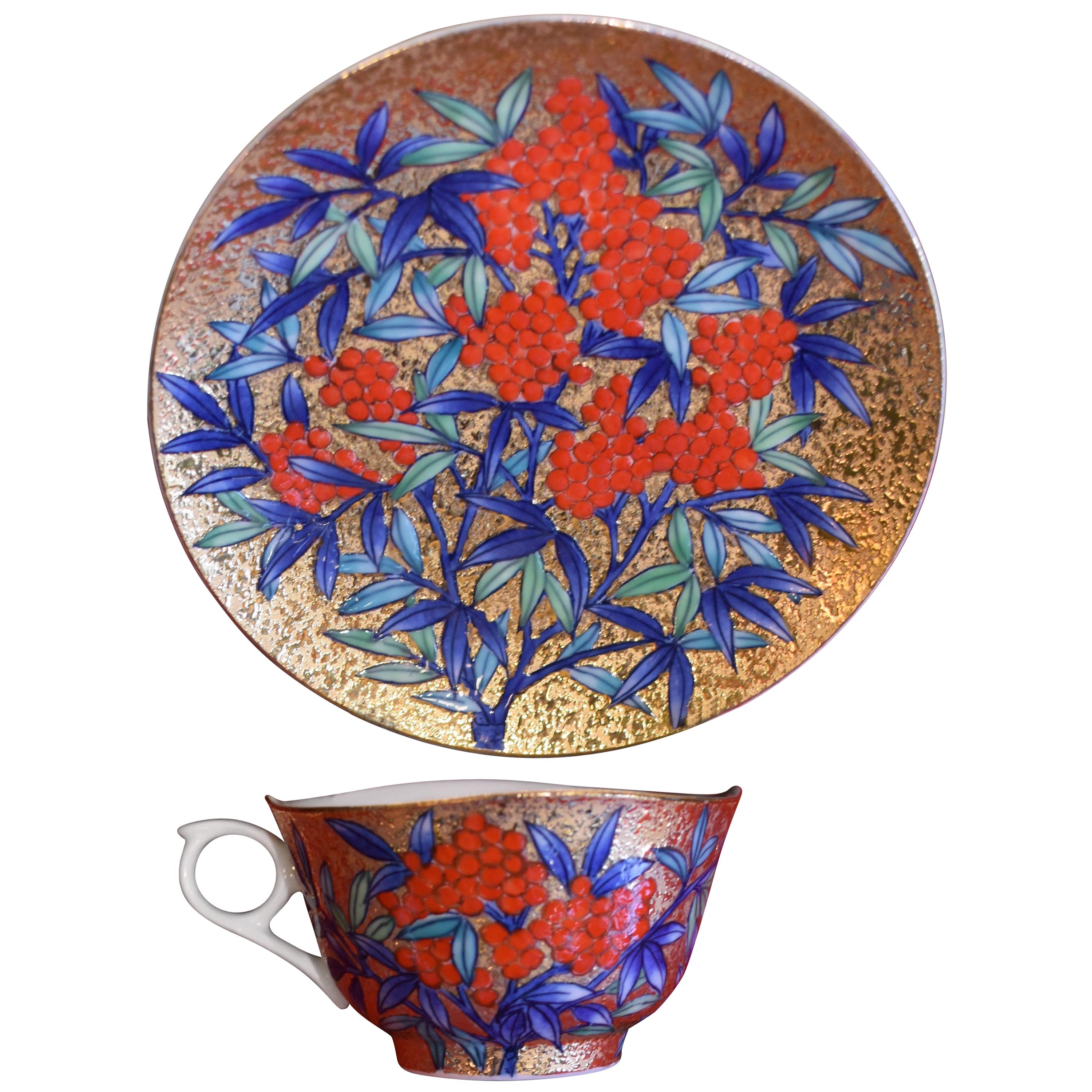 Gilded Japanese red Blue Porcelain Cup and Saucer by Master Artist