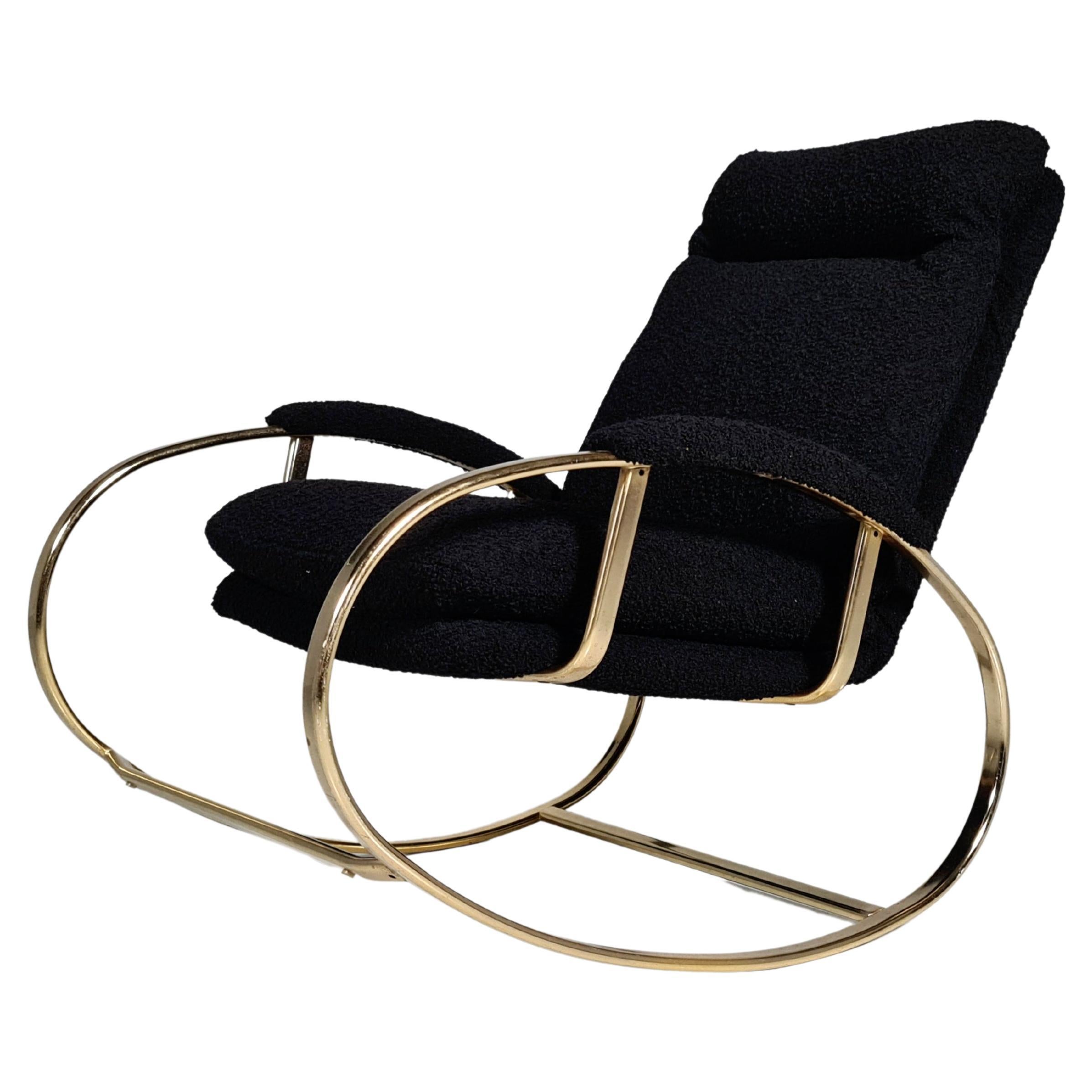 Rocking chair designed by Guido Faleschini 1970. With curved and gilded metal. Reupholstered in a black boucle by Bisson Bruneel.