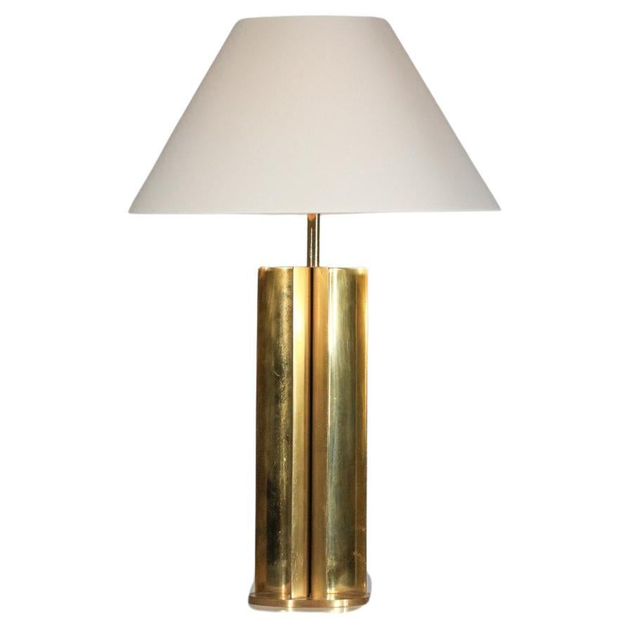 French modernist table lamp from the 50's. Lamp base in gilded metal. Lampshade available on request. Nice vintage condition, slight traces of time and use on the base, small rust spots (see photos). Electrical system refurbished, we recommend a B22