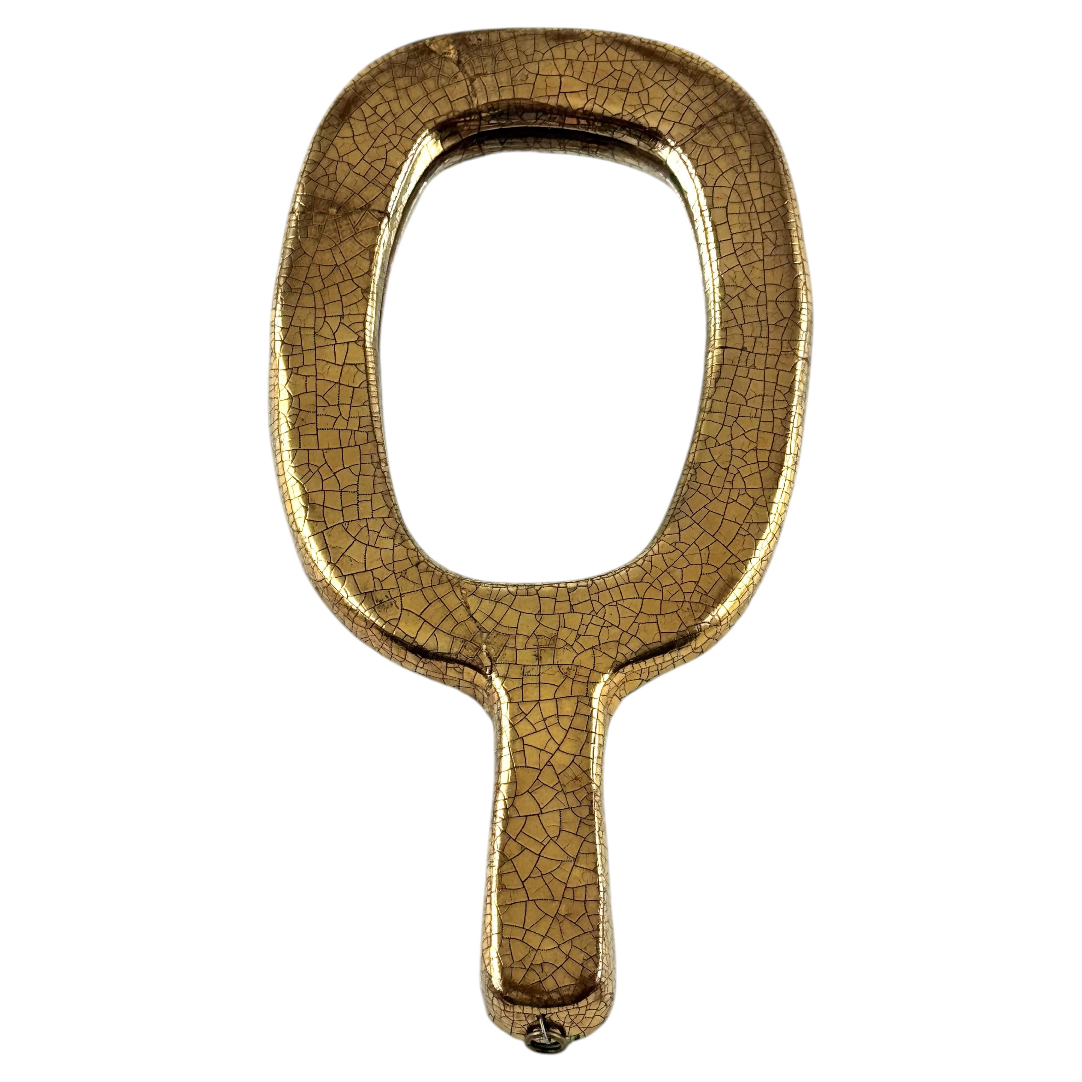 Miroir doré en vente