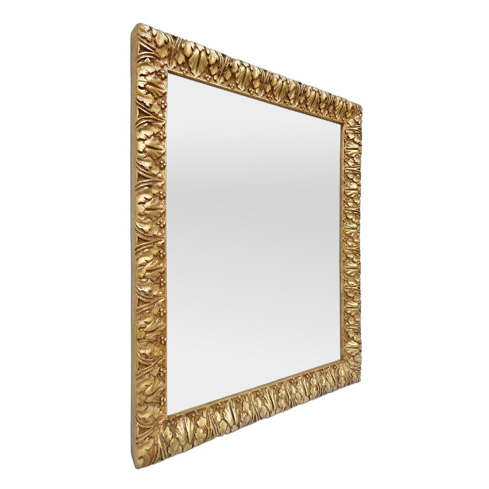 Patinated gilded mirror in wood and stucco decorated with stylized acanthus leaf friezes inspired by 17th century Italian Renaissance. Gilding to the leaf. Made by Atelier RTCD Paris in 2012. Antique frame width: 6 cm / 2.36 in. Modern glass mirror.