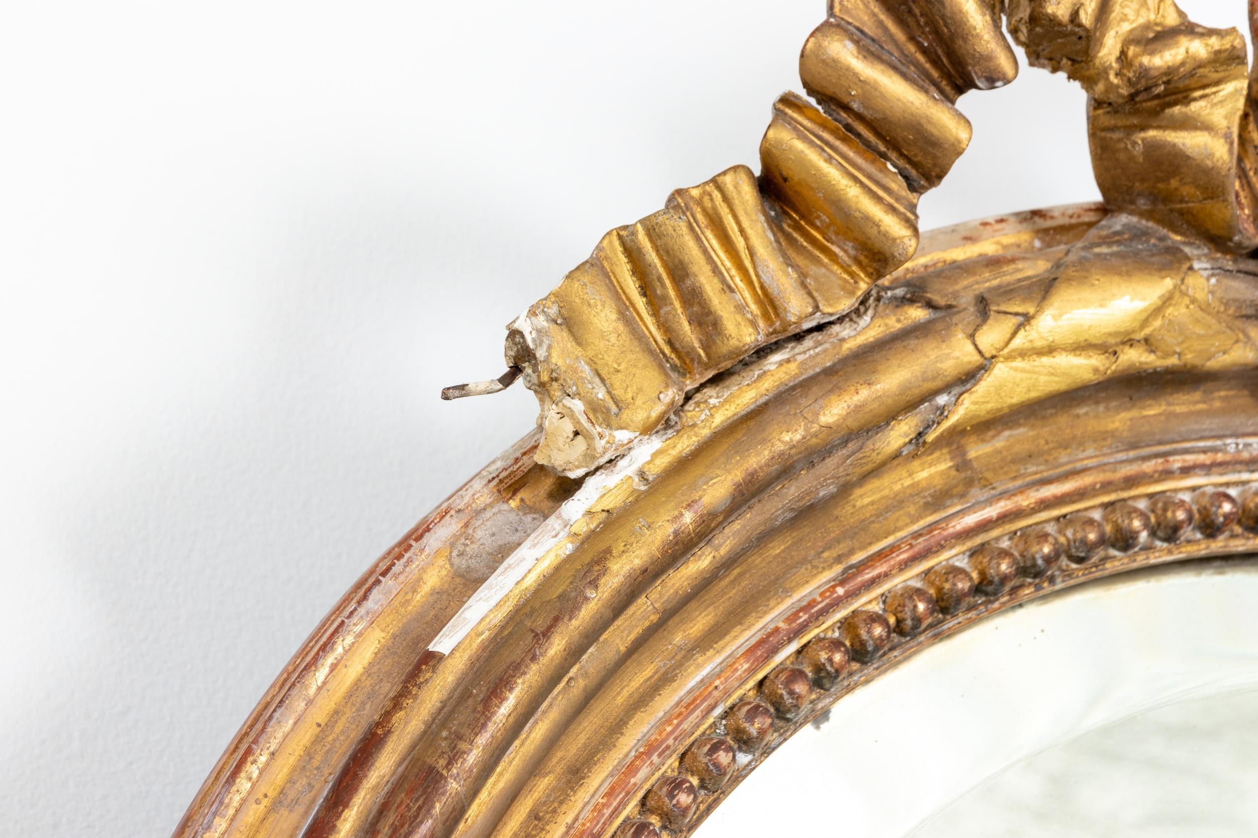 French Gilded Oval Mirror with Bow Detail