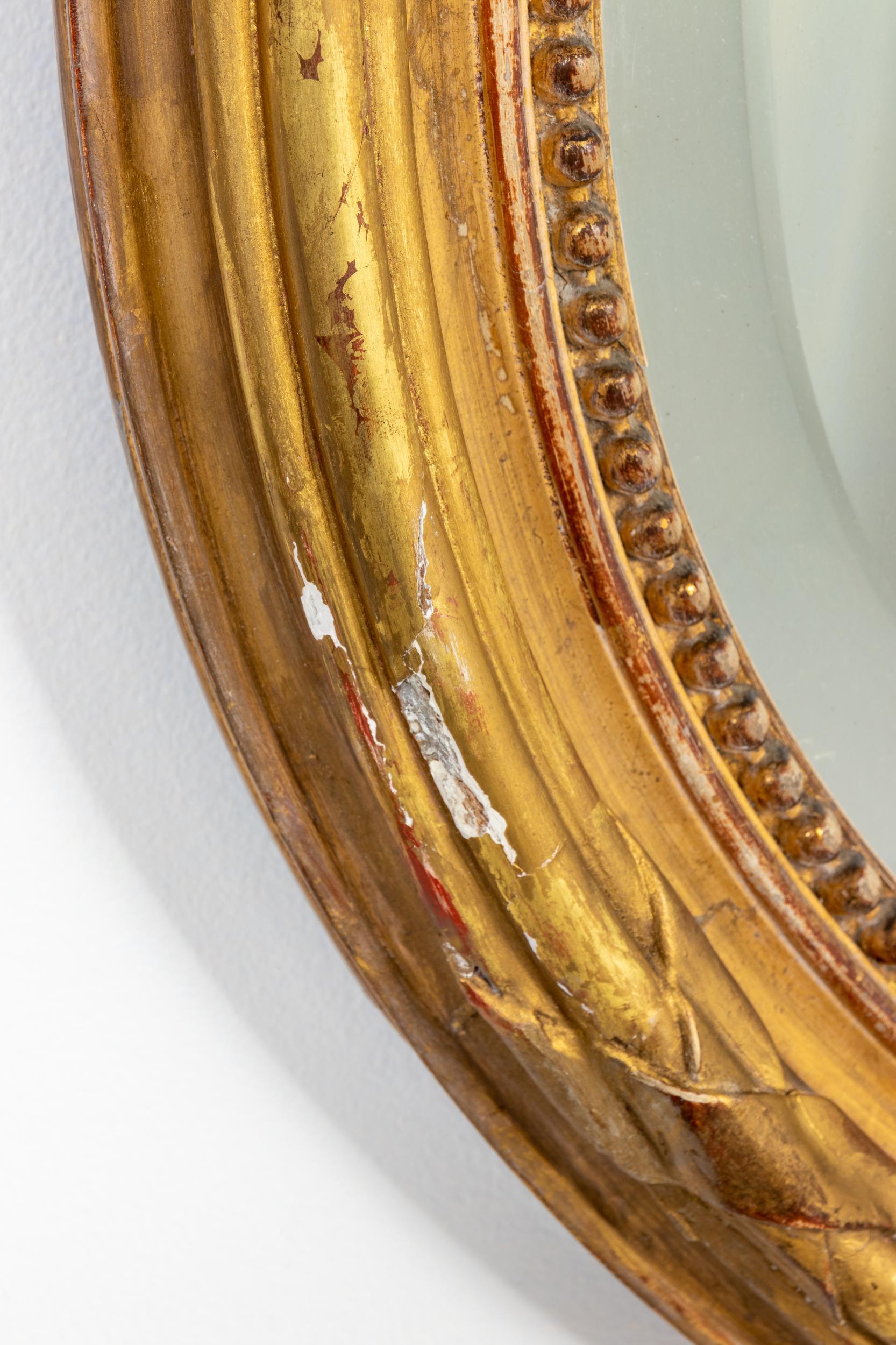 Appliqué Gilded Oval Mirror with Bow Detail