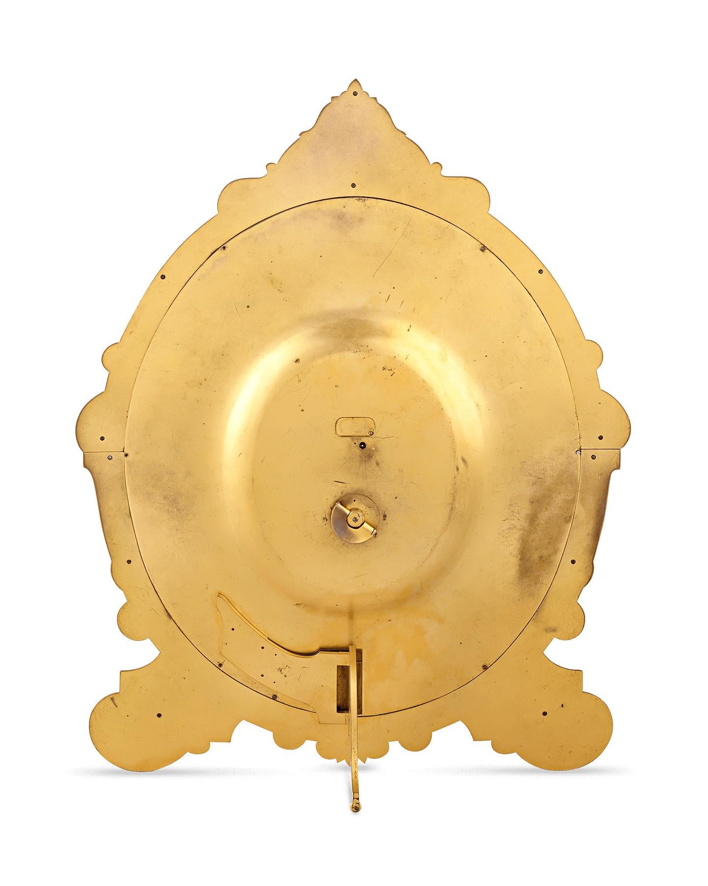 English Gilded Oval Strut Clock by Thomas Cole of London