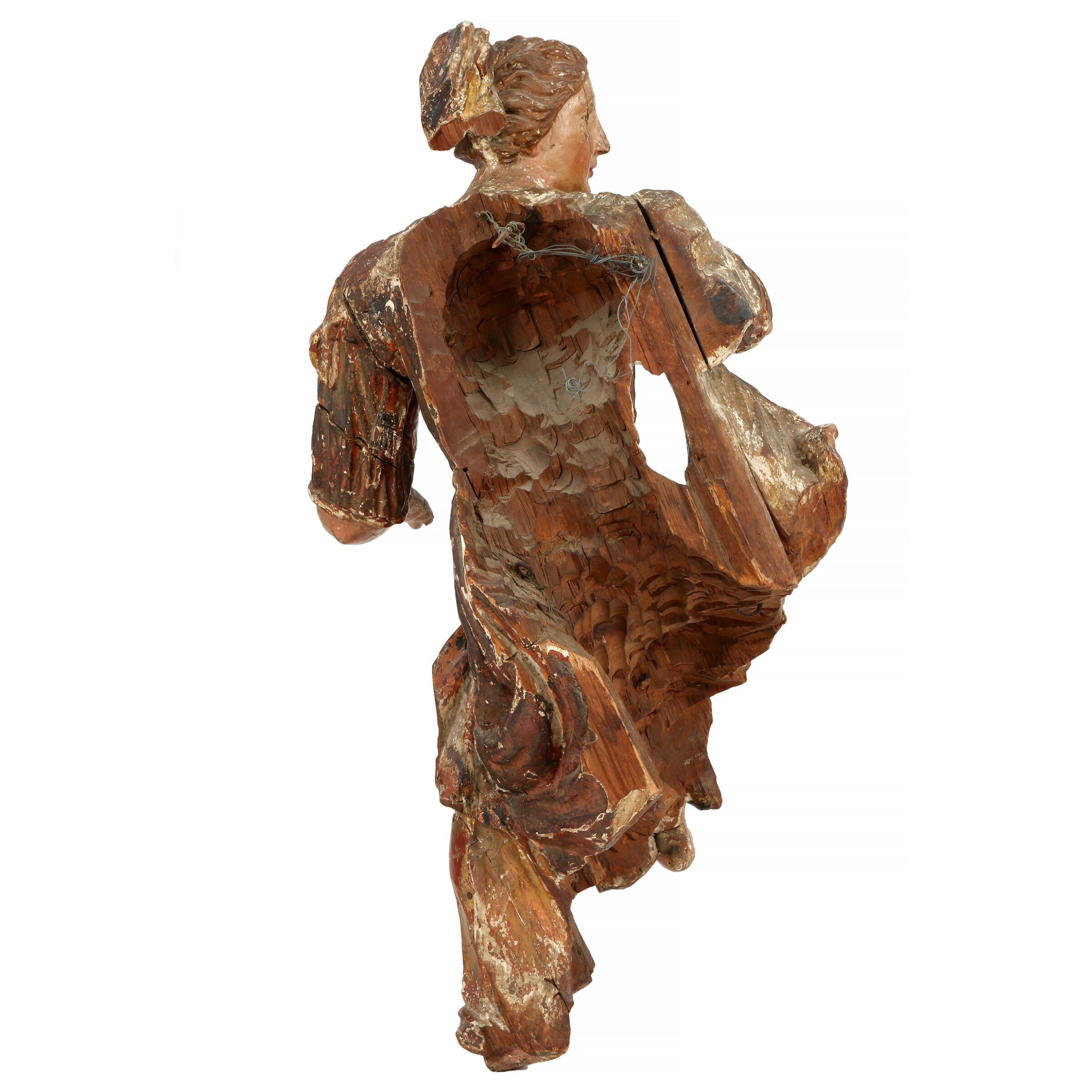 A wonderfully carved, large, painted and gilded German Baroque figure in the shape of a female, circa 1680. Measures: H. 100 cm, W. 52 cm, D. 54 cm. In.