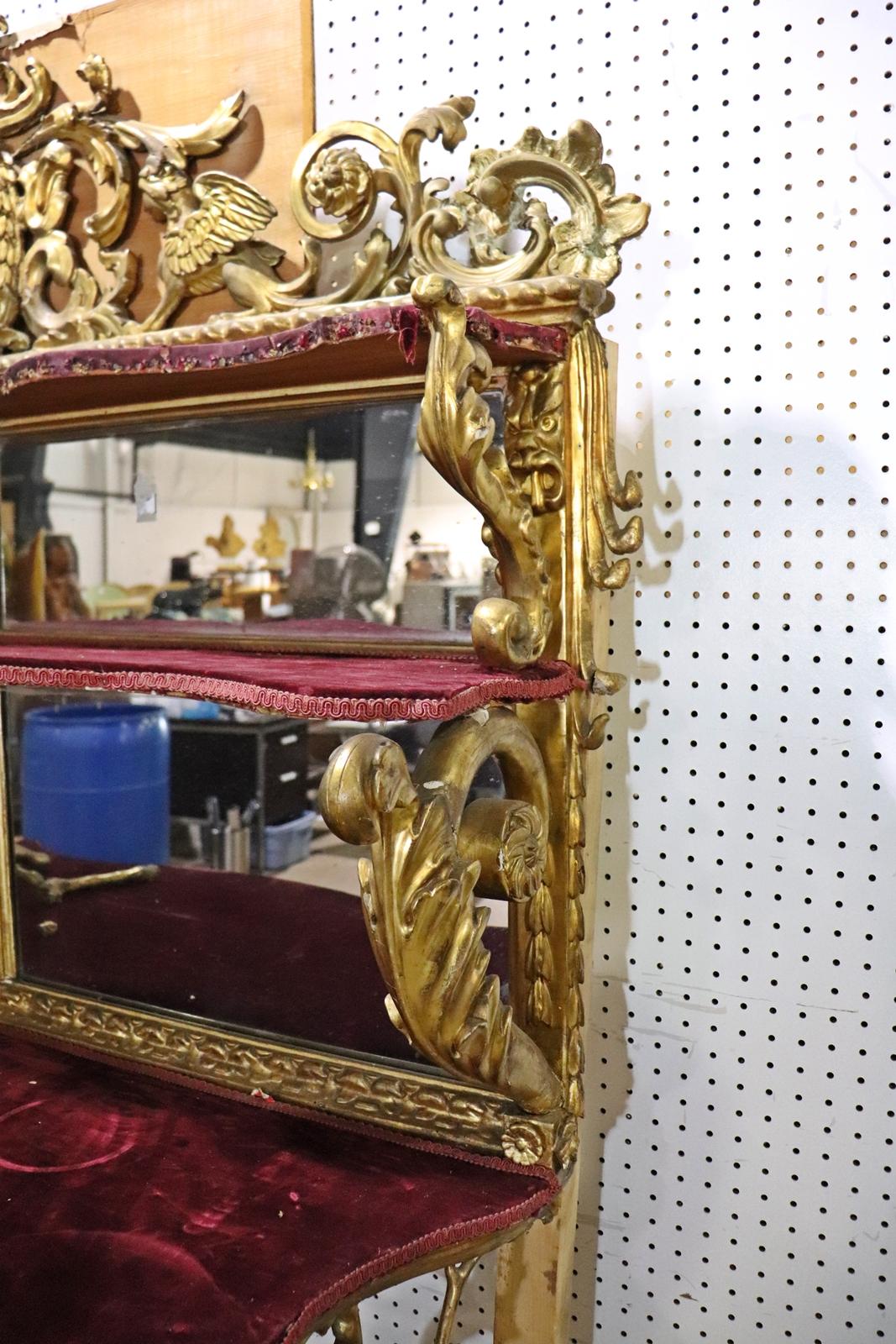 Late 19th Century Gilded Palatial Mirrored Console Cabinet Vitrine with Putti For Sale